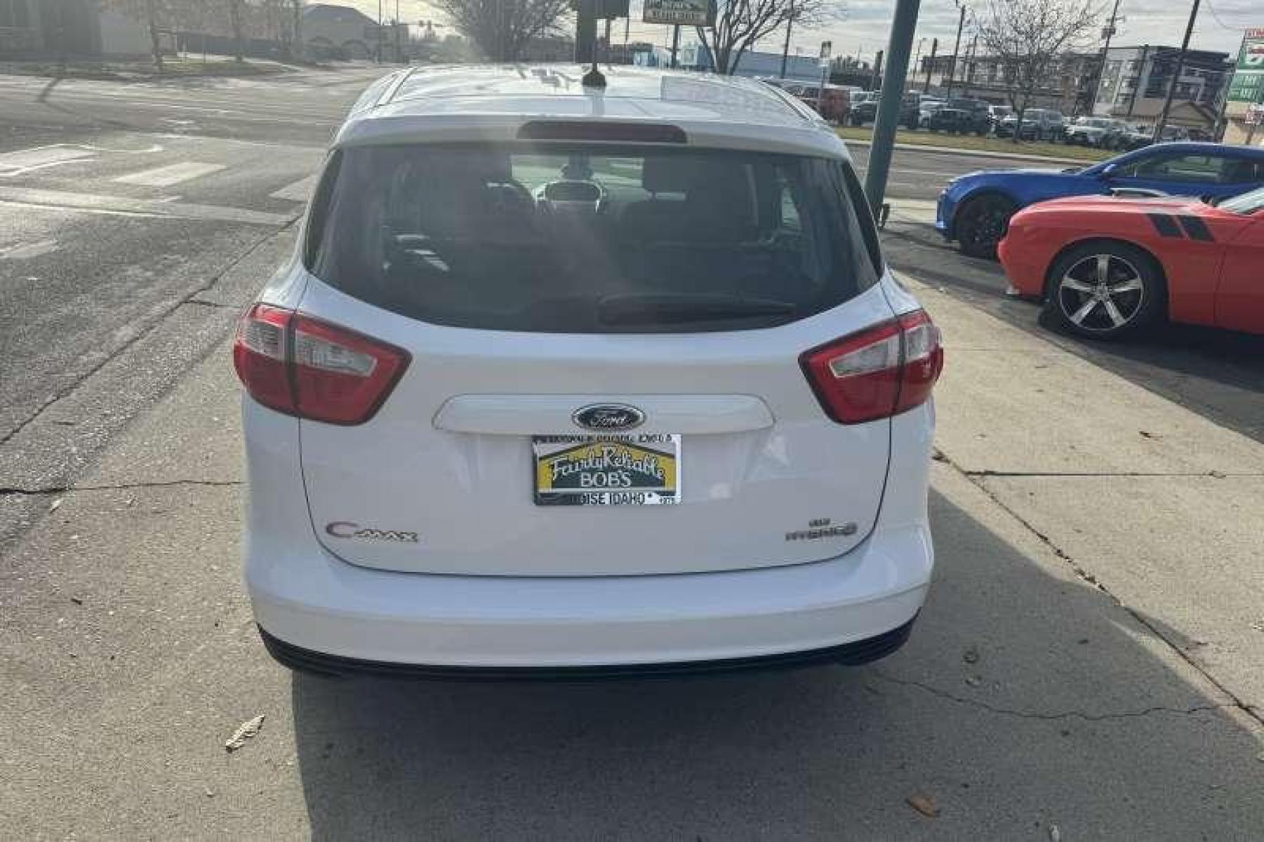 2014 Oxford White /Stone Ford C-Max Hybrid SE Hatchback (1FADP5AU8EL) with an 4 Cyl 2.0 Liter Hybrid engine, Automatic transmission, located at 2304 W. Main St., Boise, ID, 83702, (208) 342-7777, 43.622105, -116.218658 - Low Mileage and 36 MPG Highway and Over 40 City! Financing Available O.A.C. - Photo #1