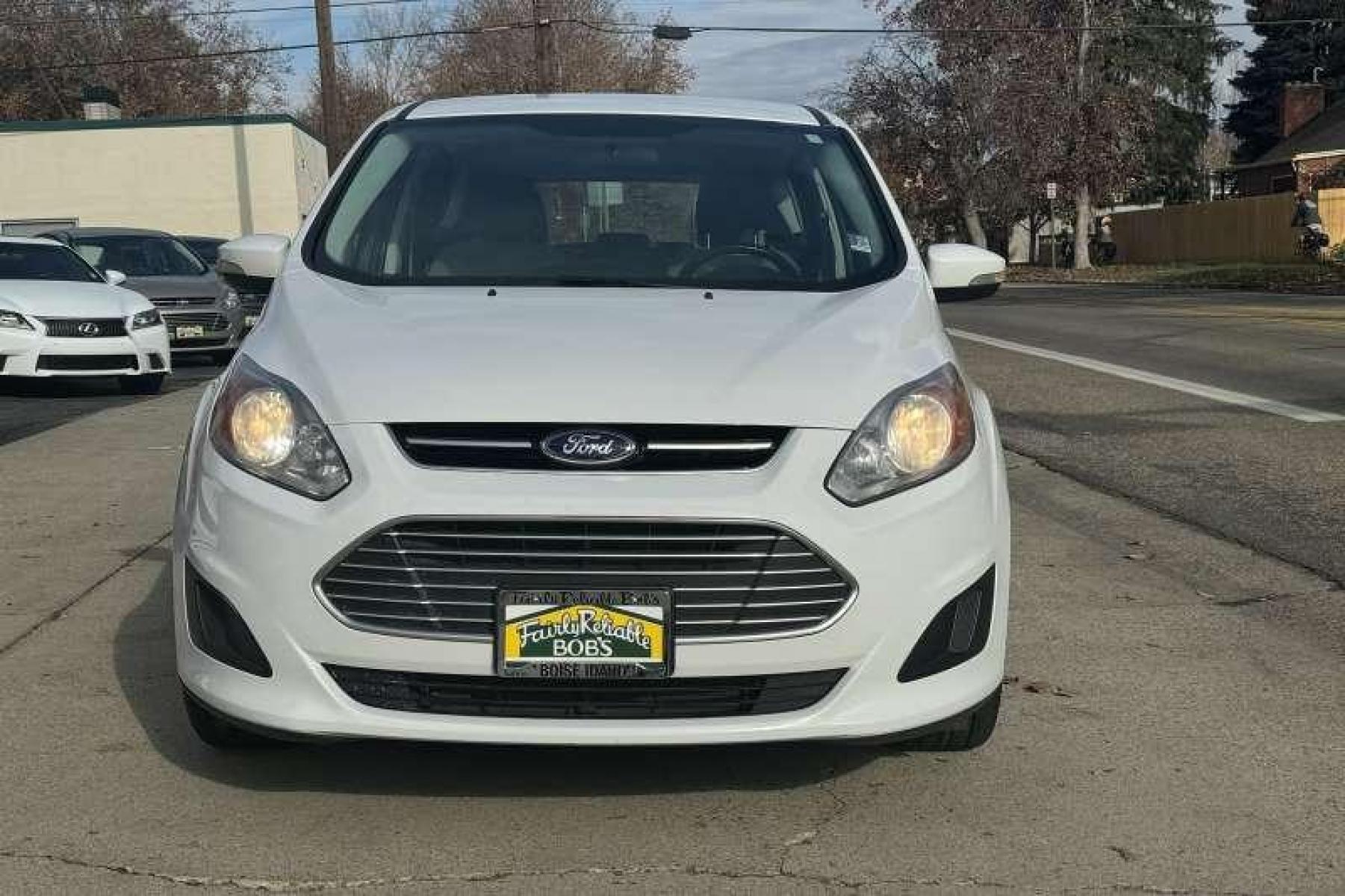 2014 Oxford White /Stone Ford C-Max Hybrid SE Hatchback (1FADP5AU8EL) with an 4 Cyl 2.0 Liter Hybrid engine, Automatic transmission, located at 2304 W. Main St., Boise, ID, 83702, (208) 342-7777, 43.622105, -116.218658 - Low Mileage and 36 MPG Highway and Over 40 City! Financing Available O.A.C. - Photo #2