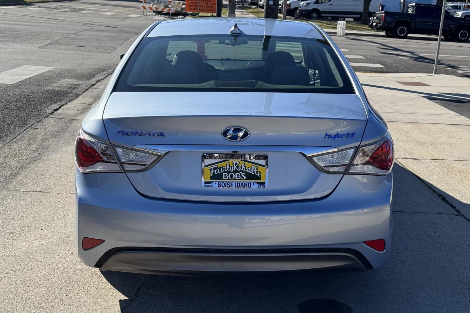 2015 Marlin Blue /Gray Hyundai Sonata Hybrid (KMHEC4A47FA) with an 4 Cyl 2.4 Liter Hybrid engine, Automatic transmission, located at 2304 W. Main St., Boise, ID, 83702, (208) 342-7777, 43.622105, -116.218658 - 35 MPG City and 38 Highway! Smooth Ride Too! - Photo#1