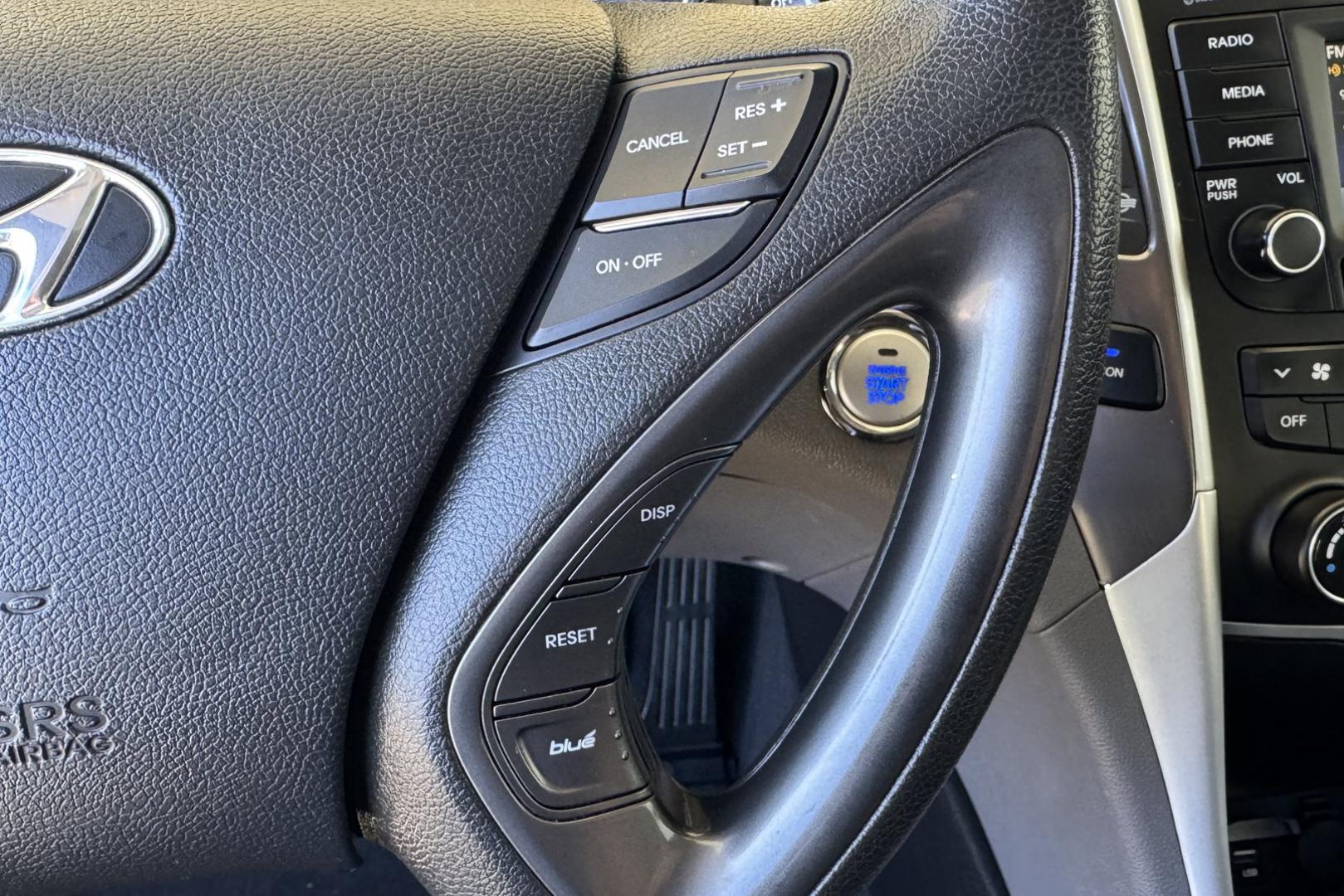 2015 Marlin Blue /Gray Hyundai Sonata Hybrid (KMHEC4A47FA) with an 4 Cyl 2.4 Liter Hybrid engine, Automatic transmission, located at 2304 W. Main St., Boise, ID, 83702, (208) 342-7777, 43.622105, -116.218658 - 35 MPG City and 38 Highway! Smooth Ride Too! - Photo#5