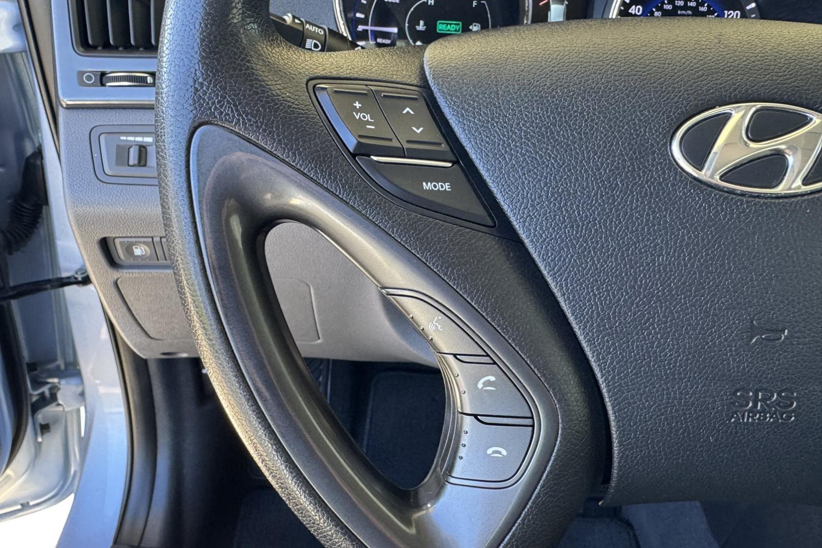 2015 Marlin Blue /Gray Hyundai Sonata Hybrid (KMHEC4A47FA) with an 4 Cyl 2.4 Liter Hybrid engine, Automatic transmission, located at 2304 W. Main St., Boise, ID, 83702, (208) 342-7777, 43.622105, -116.218658 - 35 MPG City and 38 Highway! Smooth Ride Too! - Photo#6