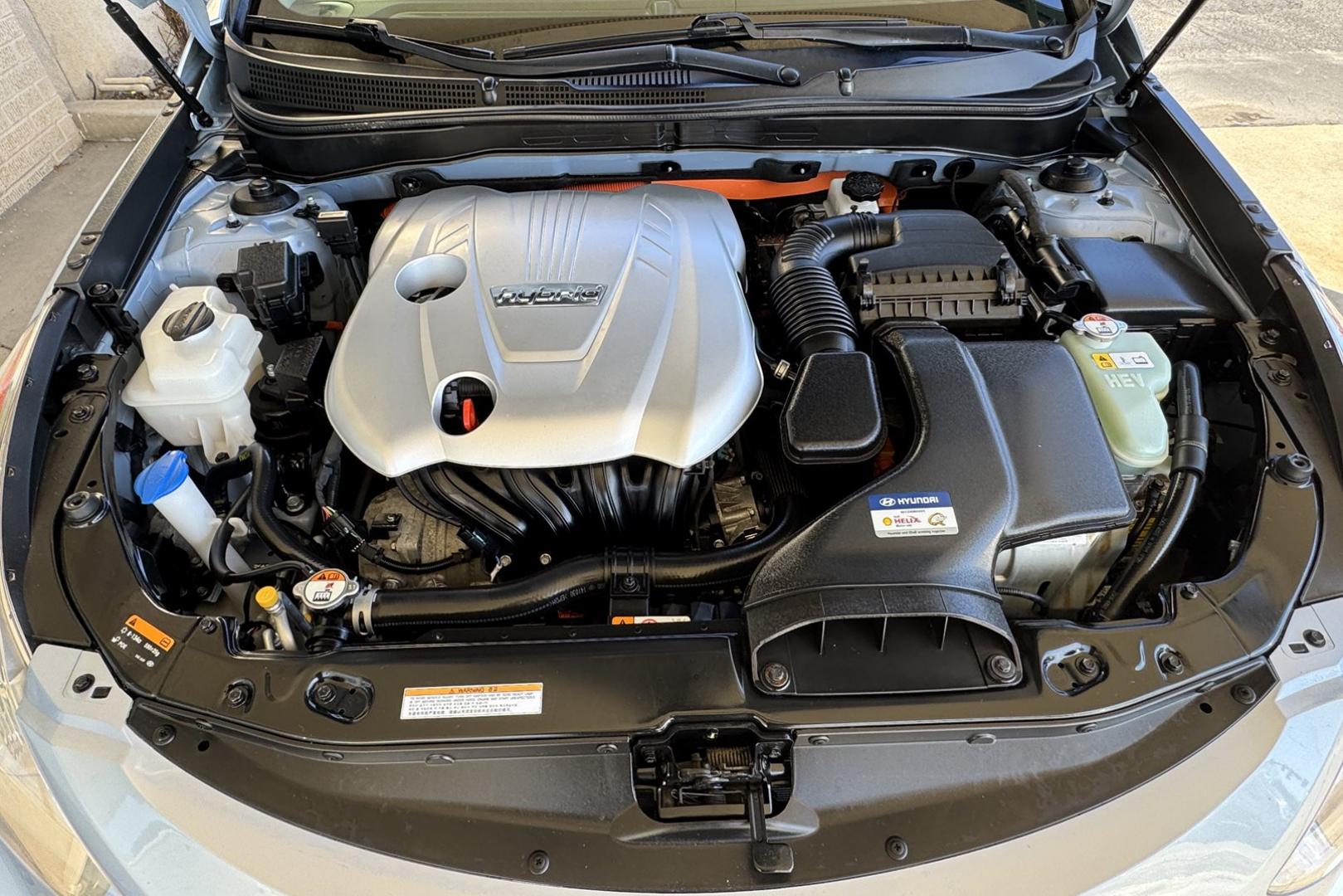 2015 Marlin Blue /Gray Hyundai Sonata Hybrid (KMHEC4A47FA) with an 4 Cyl 2.4 Liter Hybrid engine, Automatic transmission, located at 2304 W. Main St., Boise, ID, 83702, (208) 342-7777, 43.622105, -116.218658 - 35 MPG City and 38 Highway! Smooth Ride Too! - Photo#16