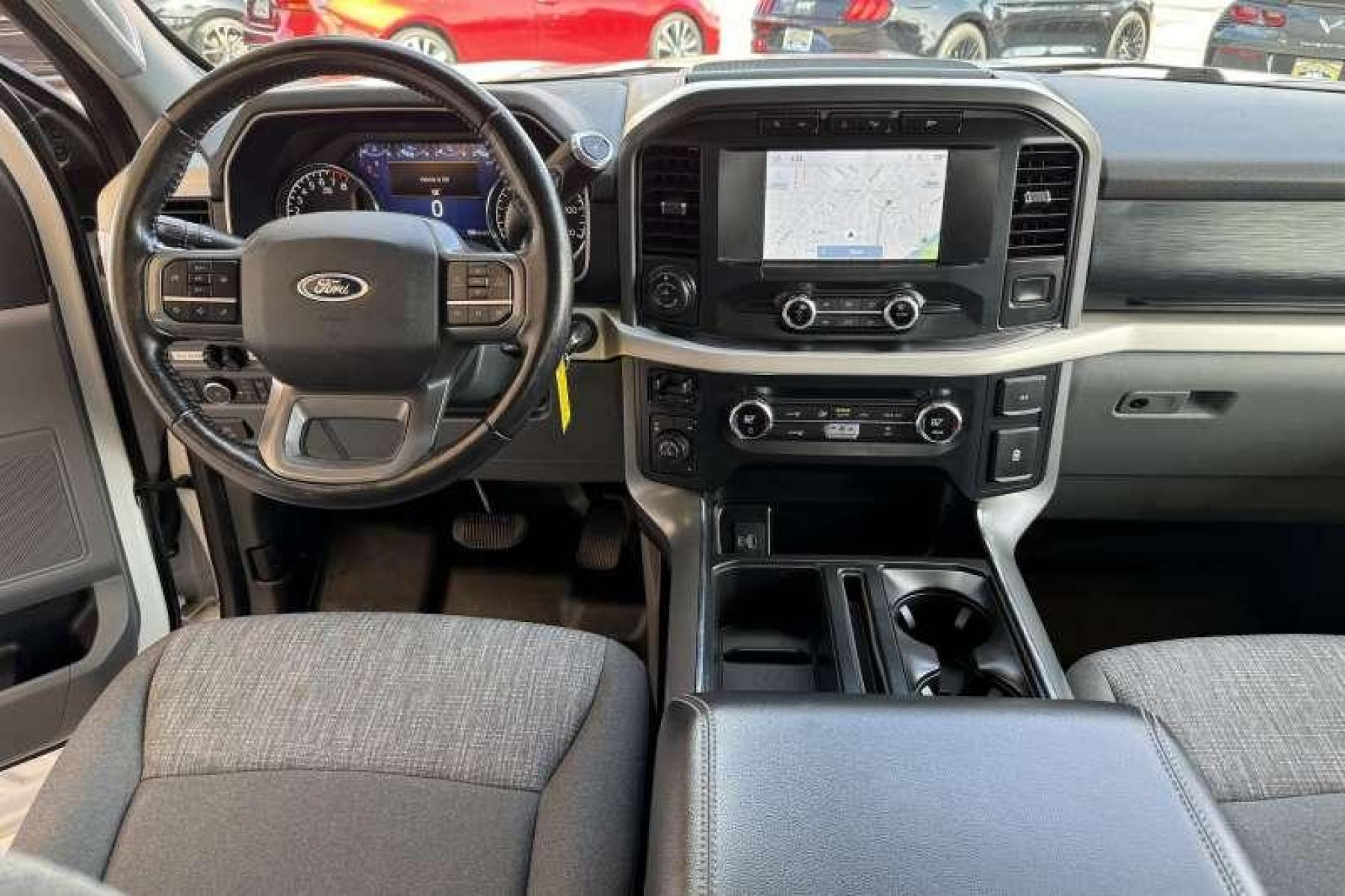 2021 Oxford White /Dark Slate Cloth Ford F-150 SuperCrew XLT (1FTFW1E57MF) with an V8 5.0 Liter engine, Automatic transmission, located at 2304 W. Main St., Boise, ID, 83702, (208) 342-7777, 43.622105, -116.218658 - Photo #10