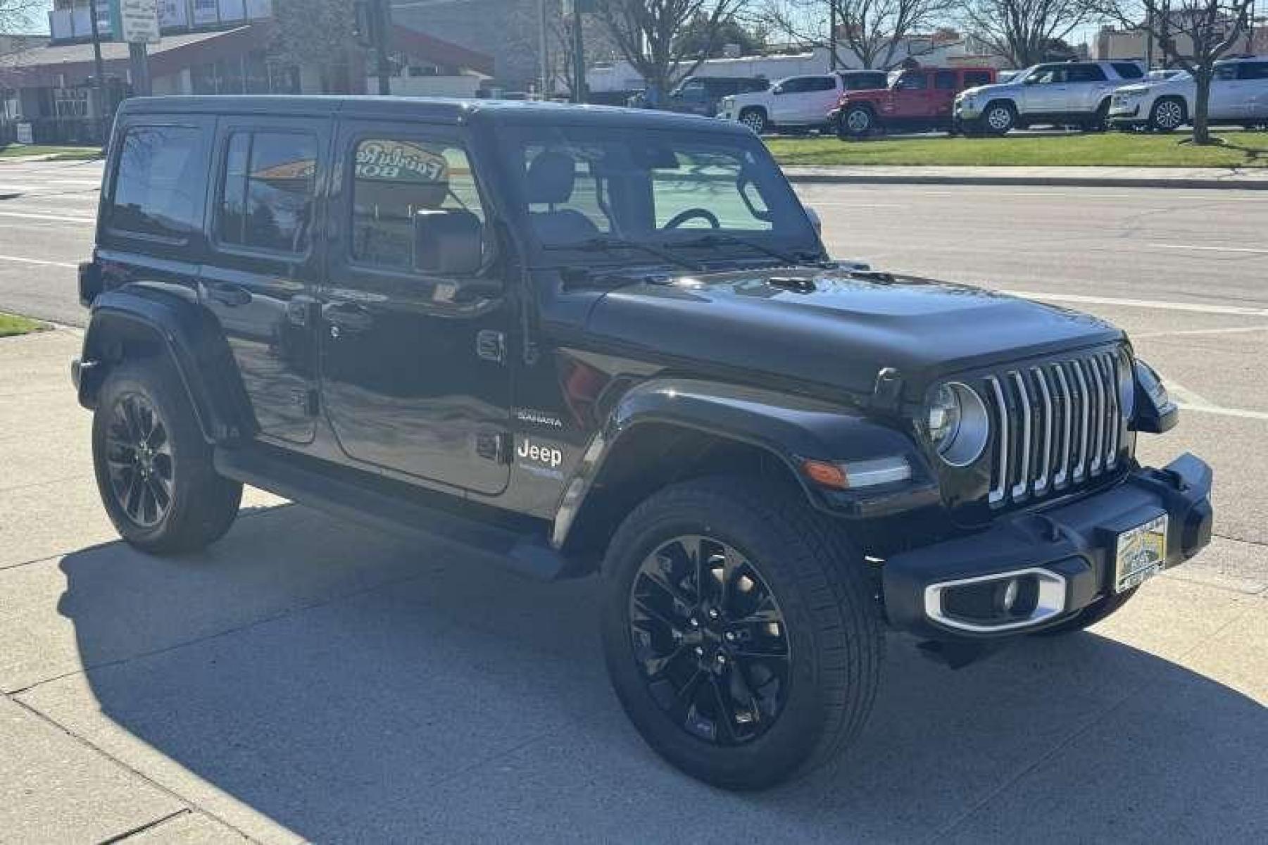 2021 Black /Black Jeep Wrangler Unlimited 4xe Sahara (1C4JJXP62MW) with an 4 Cyl 2.0 Liter Hybrid engine, Automatic transmission, located at 2304 W. Main St., Boise, ID, 83702, (208) 342-7777, 43.622105, -116.218658 - Photo #2