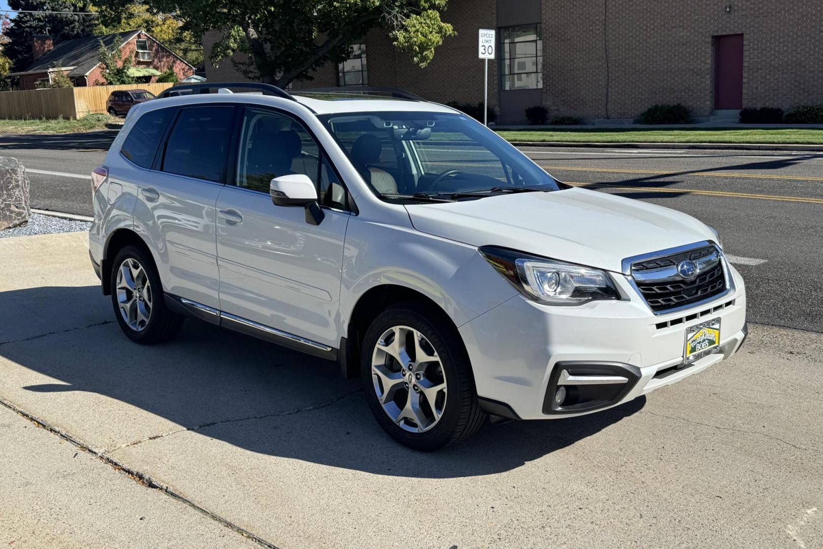 2017 White /Tobacco Subaru Forester Touring (JF2SJAWC7HH) with an H4 2.5 Liter engine, Automatic transmission, located at 2304 W. Main St., Boise, ID, 83702, (208) 342-7777, 43.622105, -116.218658 - Low Mileage And Highly Optioned! Loaded With Safety Features! - Photo#2