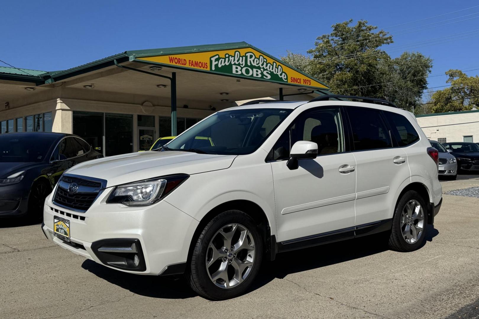 2017 White /Tobacco Subaru Forester Touring (JF2SJAWC7HH) with an H4 2.5 Liter engine, Automatic transmission, located at 2304 W. Main St., Boise, ID, 83702, (208) 342-7777, 43.622105, -116.218658 - Low Mileage And Highly Optioned! Loaded With Safety Features! - Photo#0