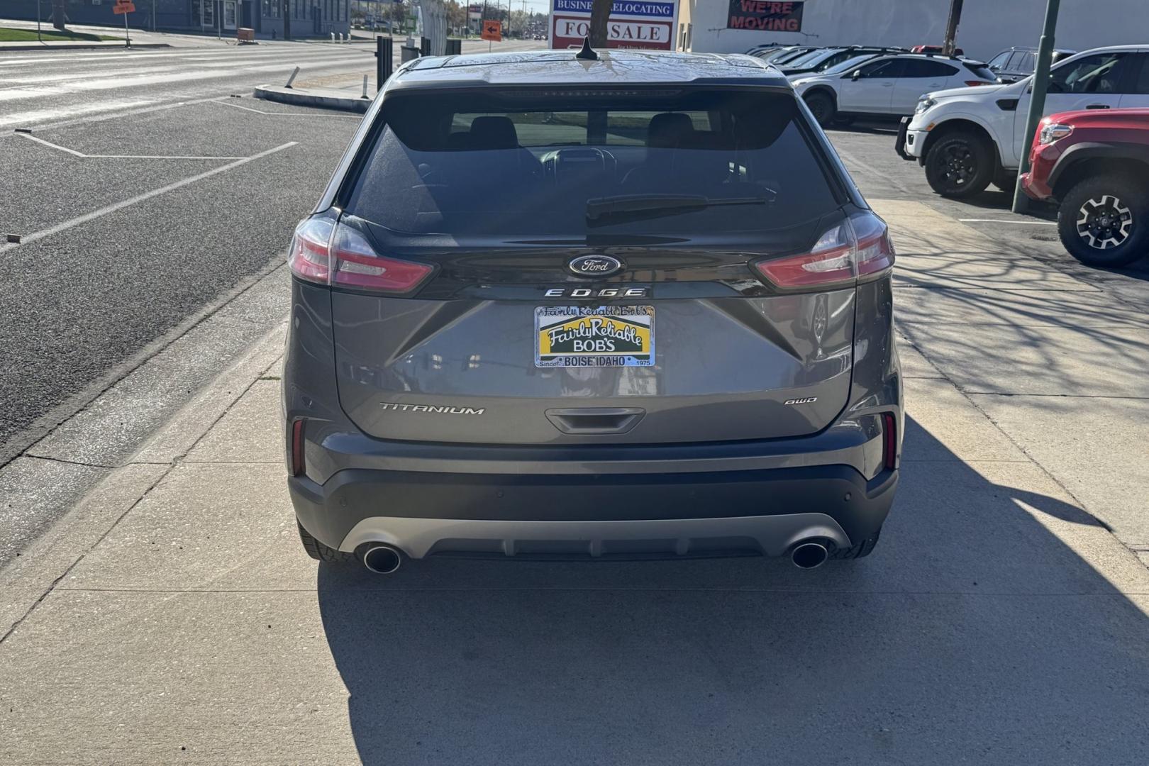 2022 Carbonized Gray Metallic /Black Ford Edge Titanium (2FMPK4K91NB) with an 4 Cyl 2.0 Liter Turbo engine, Automatic 8 Speed transmission, located at 2304 W. Main St., Boise, ID, 83702, (208) 342-7777, 43.622105, -116.218658 - Highly Optioned! Smooth Ride! All Wheel Drive! - Photo#1