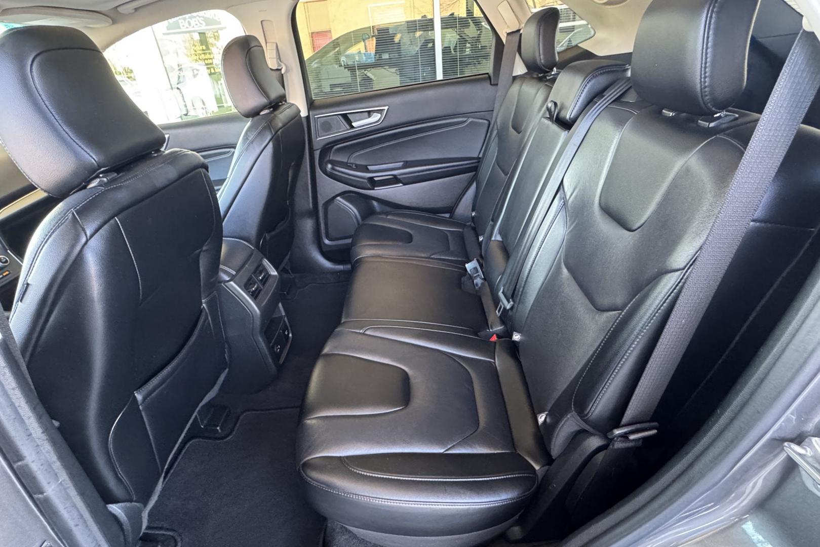 2022 Carbonized Gray Metallic /Black Ford Edge Titanium (2FMPK4K91NB) with an 4 Cyl 2.0 Liter Turbo engine, Automatic 8 Speed transmission, located at 2304 W. Main St., Boise, ID, 83702, (208) 342-7777, 43.622105, -116.218658 - Highly Optioned! Smooth Ride! All Wheel Drive! - Photo#17