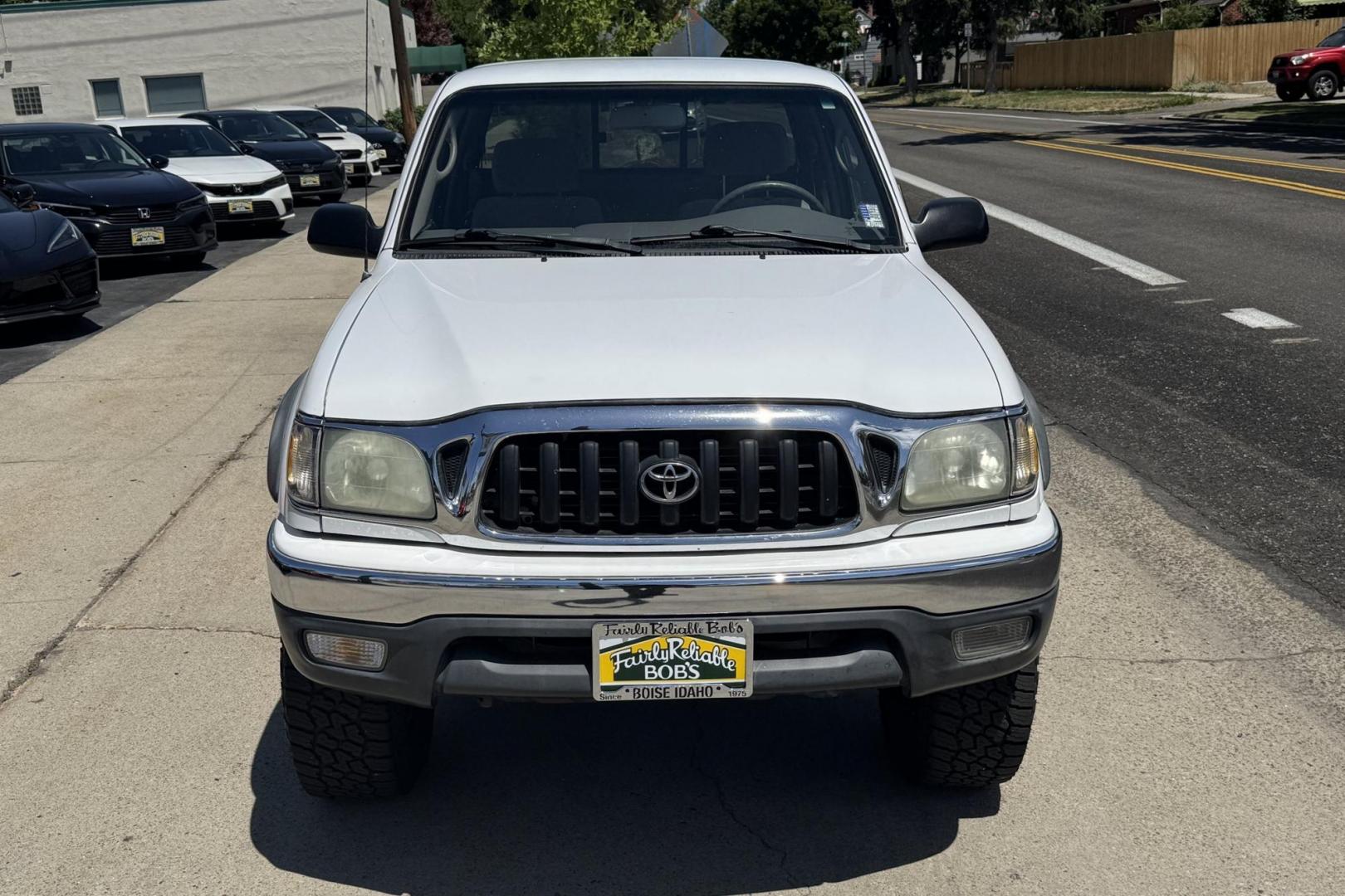 2002 White /Gray Toyota Tacoma SR5 TRD Off Road (5TEWM72N72Z) with an 4 Cyl 2.7 Liter engine, 5 Speed Manual transmission, located at 2304 W. Main St., Boise, ID, 83702, (208) 342-7777, 43.622105, -116.218658 - Clean! Locally Owned Tacoma! - Photo#4