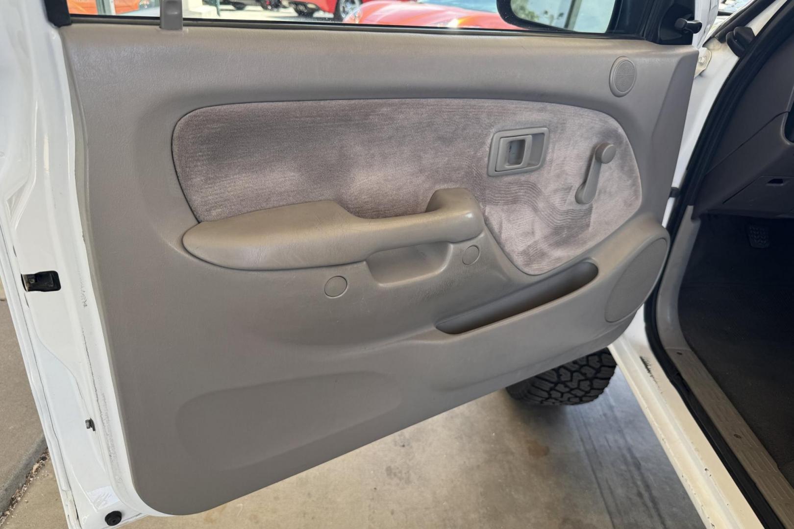 2002 White /Gray Toyota Tacoma SR5 TRD Off Road (5TEWM72N72Z) with an 4 Cyl 2.7 Liter engine, 5 Speed Manual transmission, located at 2304 W. Main St., Boise, ID, 83702, (208) 342-7777, 43.622105, -116.218658 - Clean! Locally Owned Tacoma! - Photo#5