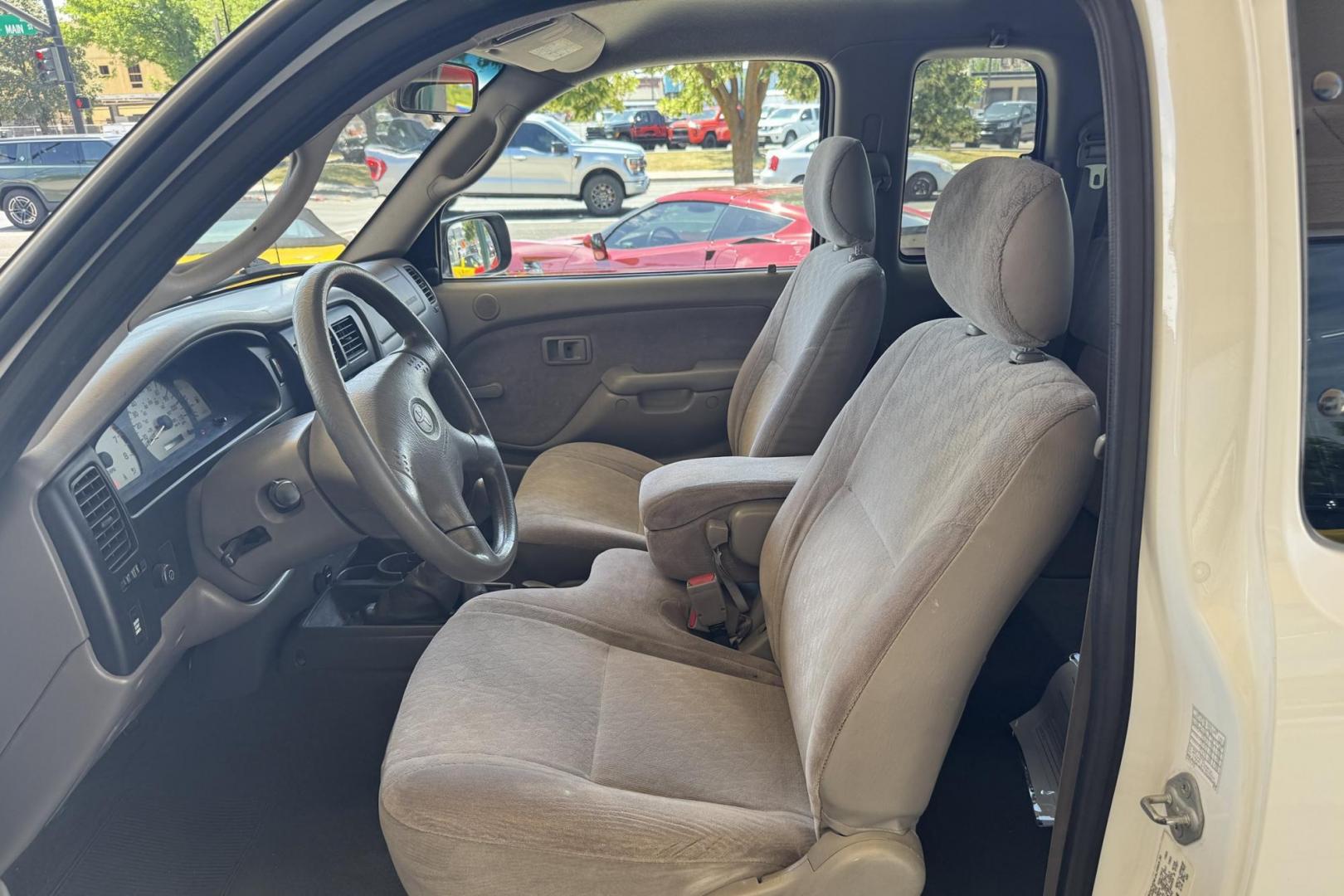 2002 White /Gray Toyota Tacoma SR5 TRD Off Road (5TEWM72N72Z) with an 4 Cyl 2.7 Liter engine, 5 Speed Manual transmission, located at 2304 W. Main St., Boise, ID, 83702, (208) 342-7777, 43.622105, -116.218658 - Clean! Locally Owned Tacoma! - Photo#6