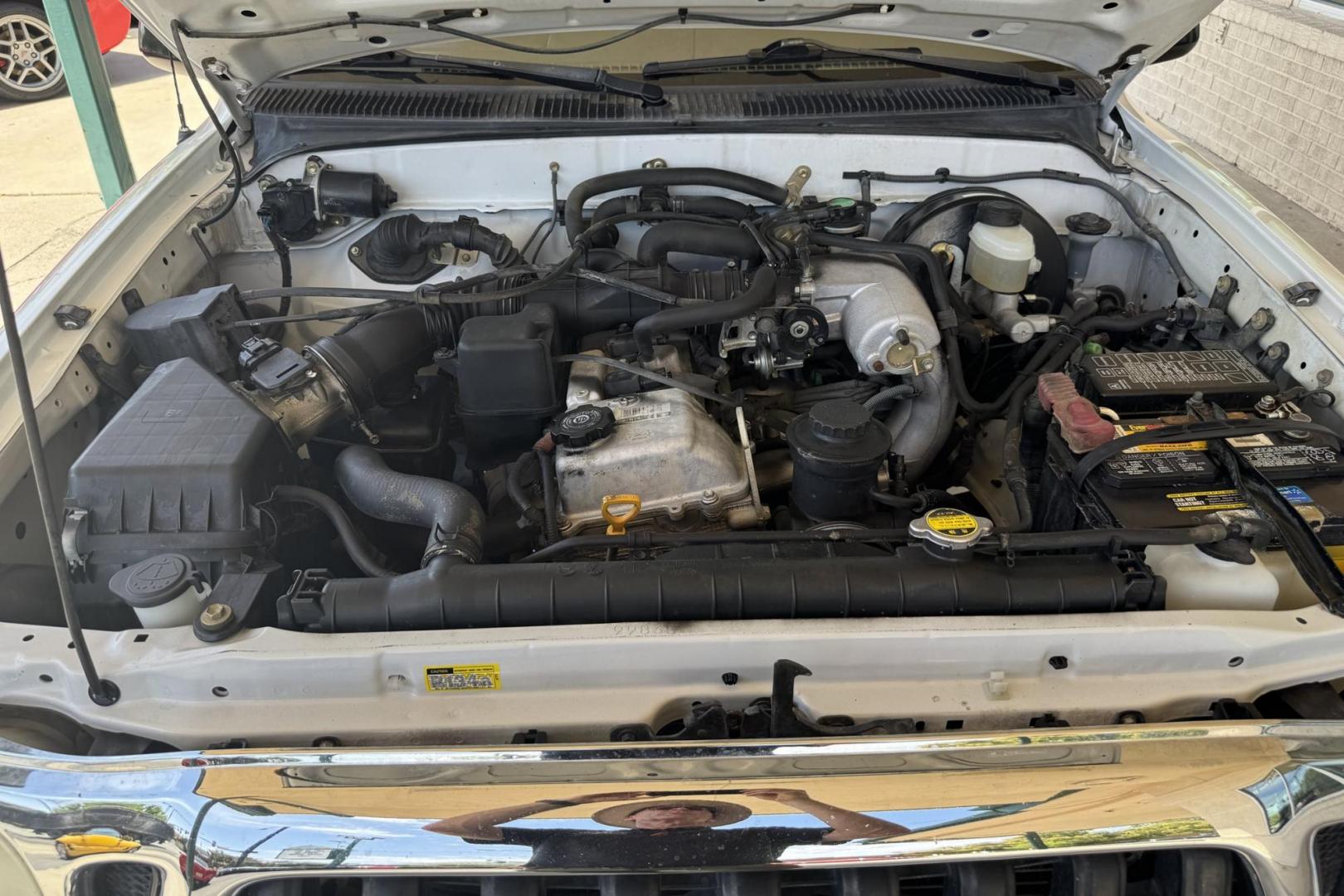 2002 White /Gray Toyota Tacoma SR5 TRD Off Road (5TEWM72N72Z) with an 4 Cyl 2.7 Liter engine, 5 Speed Manual transmission, located at 2304 W. Main St., Boise, ID, 83702, (208) 342-7777, 43.622105, -116.218658 - Clean! Locally Owned Tacoma! - Photo#8