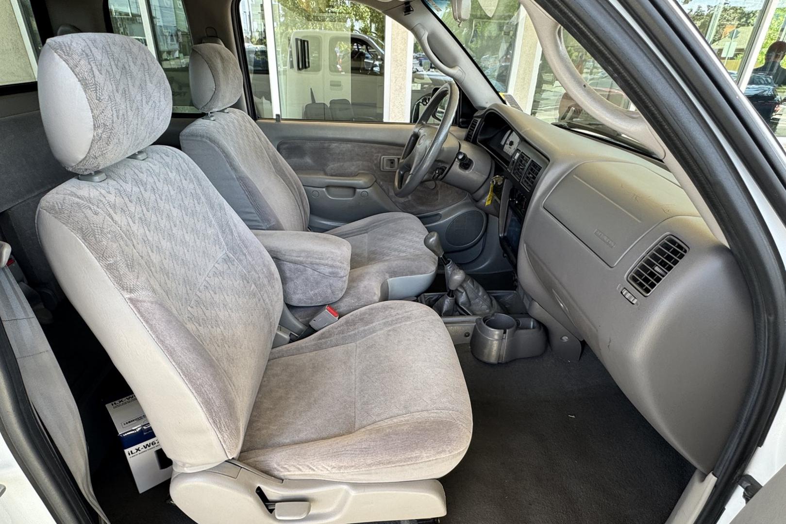 2002 White /Gray Toyota Tacoma SR5 TRD Off Road (5TEWM72N72Z) with an 4 Cyl 2.7 Liter engine, 5 Speed Manual transmission, located at 2304 W. Main St., Boise, ID, 83702, (208) 342-7777, 43.622105, -116.218658 - Clean! Locally Owned Tacoma! - Photo#10
