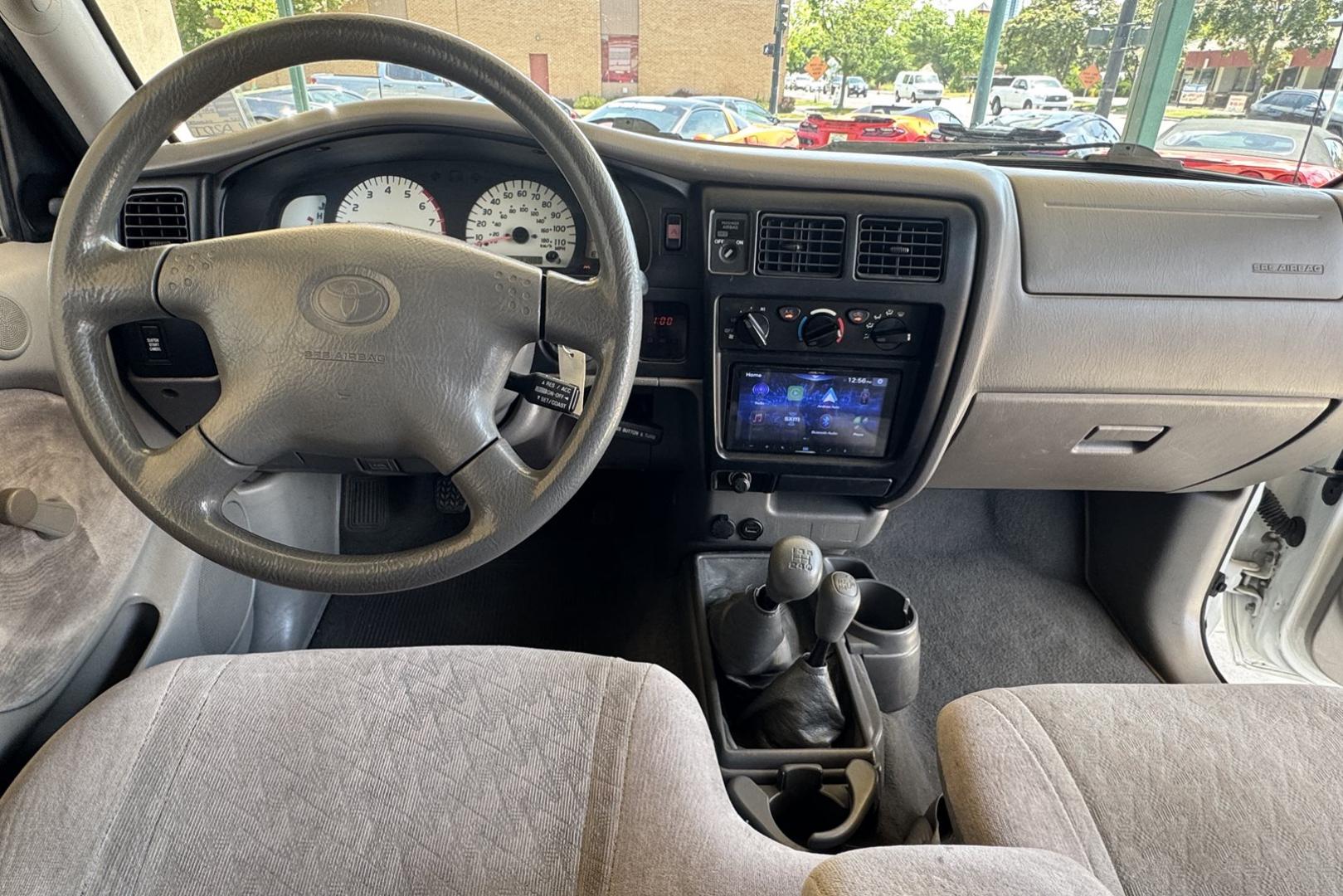 2002 White /Gray Toyota Tacoma SR5 TRD Off Road (5TEWM72N72Z) with an 4 Cyl 2.7 Liter engine, 5 Speed Manual transmission, located at 2304 W. Main St., Boise, ID, 83702, (208) 342-7777, 43.622105, -116.218658 - Clean! Locally Owned Tacoma! - Photo#14