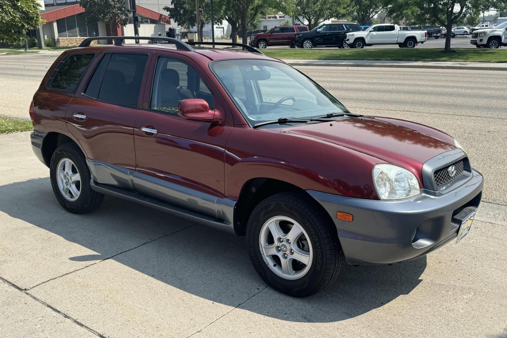 2003 Maroon /Tan Hyundai Santa Fe GLS (KM8SC73EX3U) with an V6 3.5 Liter engine, Automatic 5 Speed transmission, located at 2304 W. Main St., Boise, ID, 83702, (208) 342-7777, 43.622105, -116.218658 - 2003 HYUNDAI - Photo#2