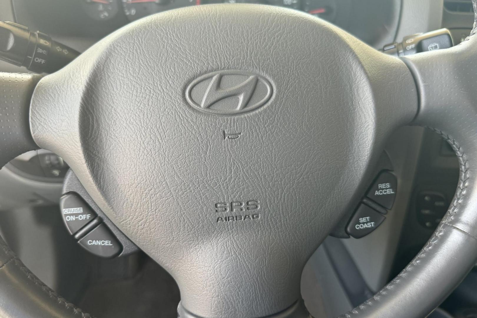 2003 Maroon /Tan Hyundai Santa Fe GLS (KM8SC73EX3U) with an V6 3.5 Liter engine, Automatic 5 Speed transmission, located at 2304 W. Main St., Boise, ID, 83702, (208) 342-7777, 43.622105, -116.218658 - 2003 HYUNDAI - Photo#10