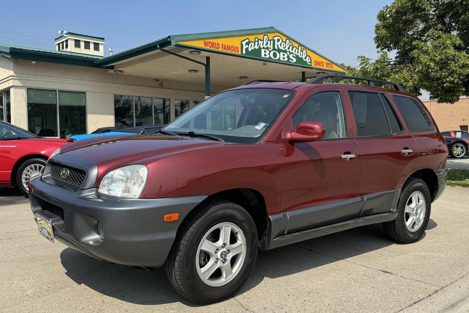 2003 Maroon /Tan Hyundai Santa Fe GLS (KM8SC73EX3U) with an V6 3.5 Liter engine, Automatic 5 Speed transmission, located at 2304 W. Main St., Boise, ID, 83702, (208) 342-7777, 43.622105, -116.218658 - 2003 HYUNDAI - Photo#0
