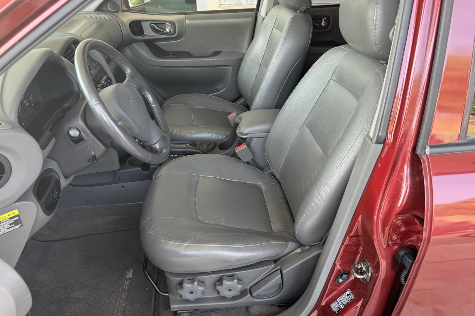 2003 Maroon /Tan Hyundai Santa Fe GLS (KM8SC73EX3U) with an V6 3.5 Liter engine, Automatic 5 Speed transmission, located at 2304 W. Main St., Boise, ID, 83702, (208) 342-7777, 43.622105, -116.218658 - 2003 HYUNDAI - Photo#5