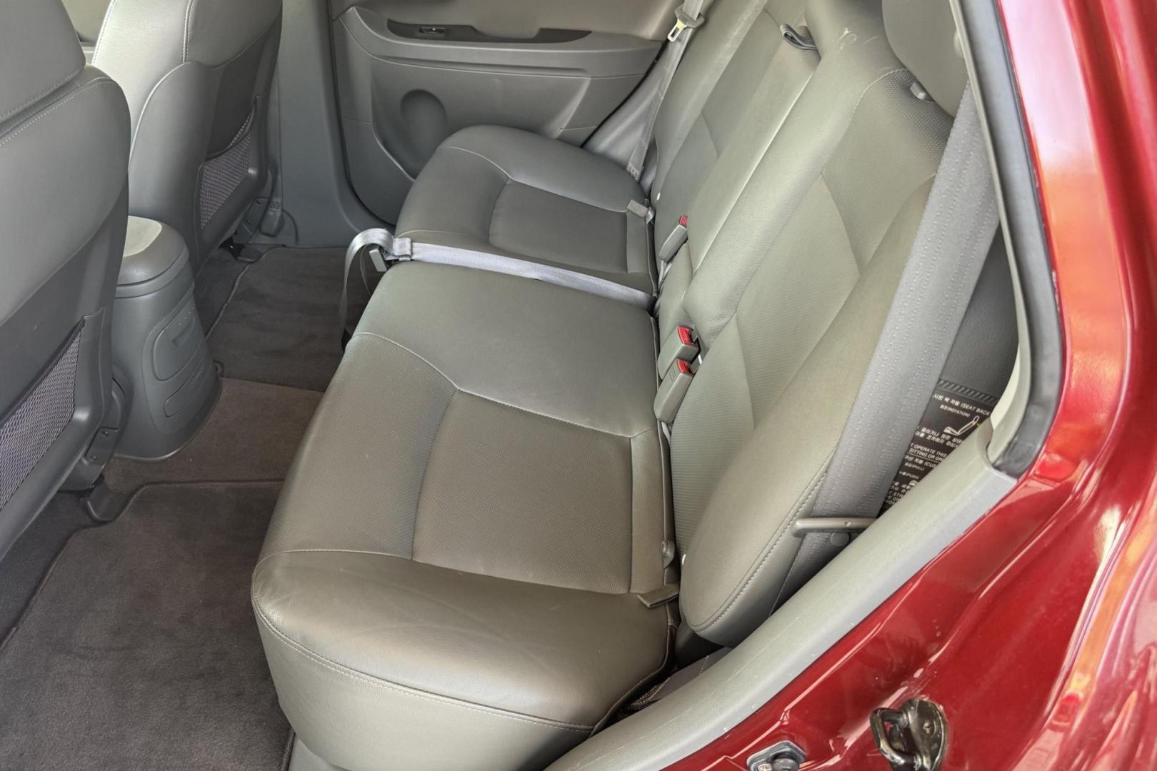 2003 Maroon /Tan Hyundai Santa Fe GLS (KM8SC73EX3U) with an V6 3.5 Liter engine, Automatic 5 Speed transmission, located at 2304 W. Main St., Boise, ID, 83702, (208) 342-7777, 43.622105, -116.218658 - 2003 HYUNDAI - Photo#7