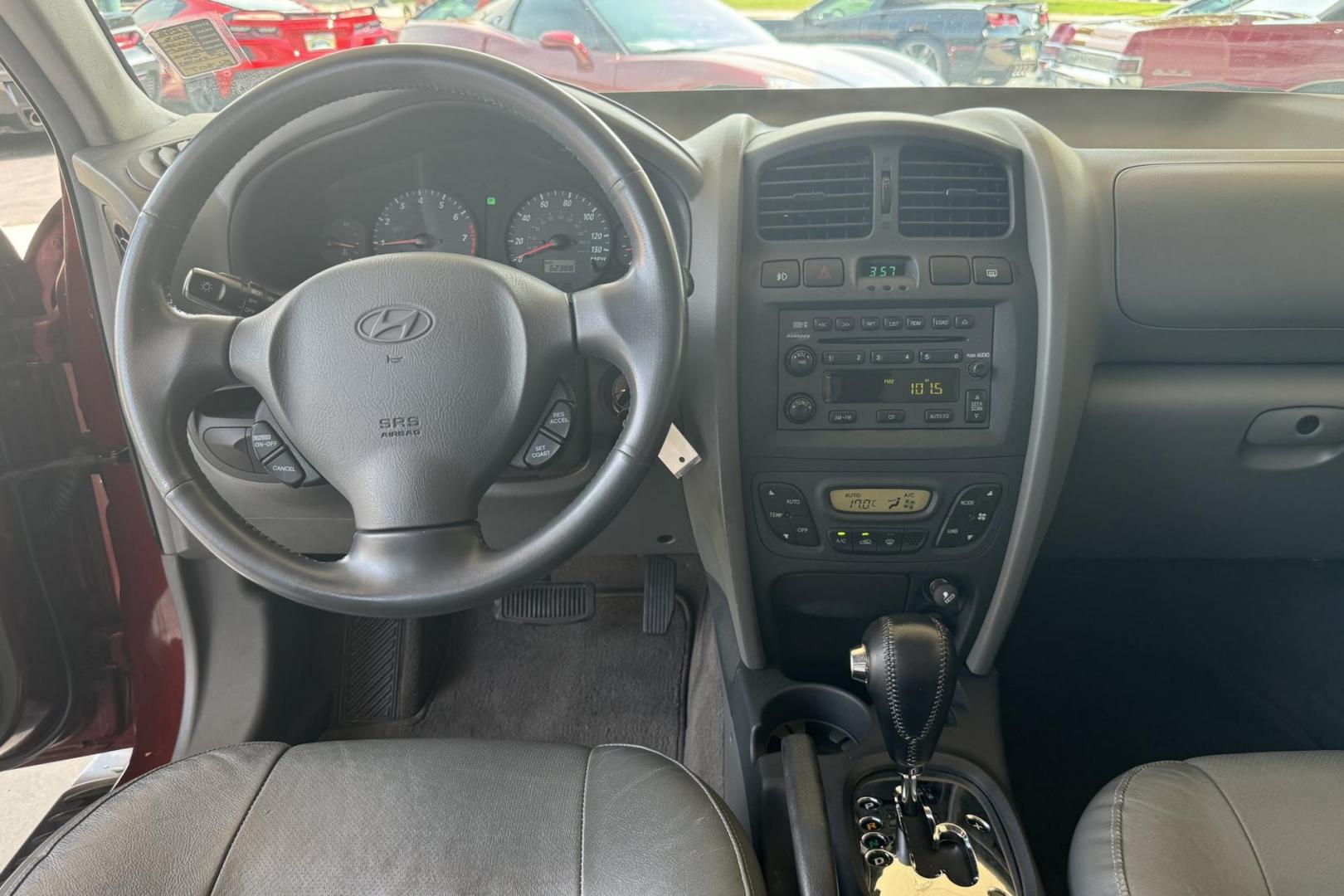 2003 Maroon /Tan Hyundai Santa Fe GLS (KM8SC73EX3U) with an V6 3.5 Liter engine, Automatic 5 Speed transmission, located at 2304 W. Main St., Boise, ID, 83702, (208) 342-7777, 43.622105, -116.218658 - 2003 HYUNDAI - Photo#9