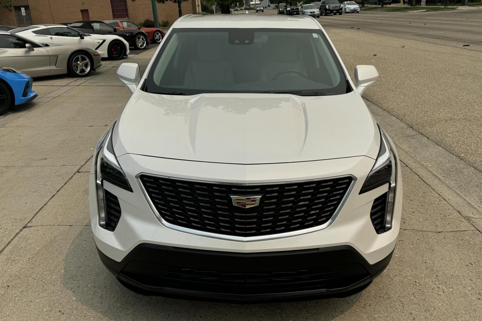 2023 White Diamond Pearl /Cashmere Cadillac XT4 AWD Luxury (1GYFZBR45PF) with an 4 Cyl 2.0 Liter Turbo engine, Automatic 9 Speed transmission, located at 2304 W. Main St., Boise, ID, 83702, (208) 342-7777, 43.622105, -116.218658 - 2023 CADILLAC - Photo#2