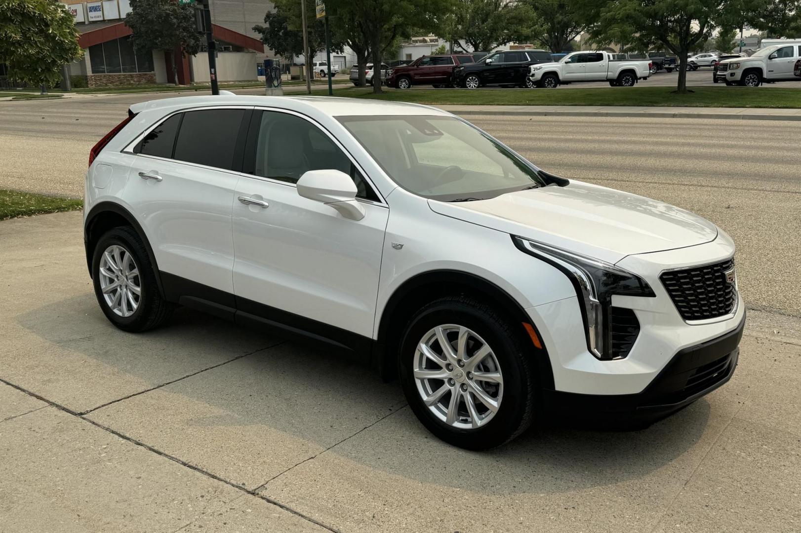 2023 White Diamond Pearl /Cashmere Cadillac XT4 AWD Luxury (1GYFZBR45PF) with an 4 Cyl 2.0 Liter Turbo engine, Automatic 9 Speed transmission, located at 2304 W. Main St., Boise, ID, 83702, (208) 342-7777, 43.622105, -116.218658 - 2023 CADILLAC - Photo#3