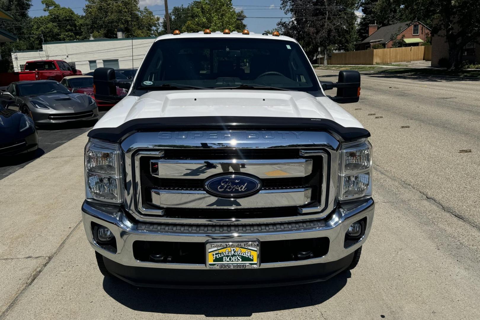 2013 White Platinum Metallic Tri-Coat /Black Ford F-350 SD Lariat (1FT8W3BT5DE) with an V8 6.7 Liter Turbo Diesel engine, Automatic 6 Speed transmission, located at 2304 W. Main St., Boise, ID, 83702, (208) 342-7777, 43.622105, -116.218658 - Photo#4
