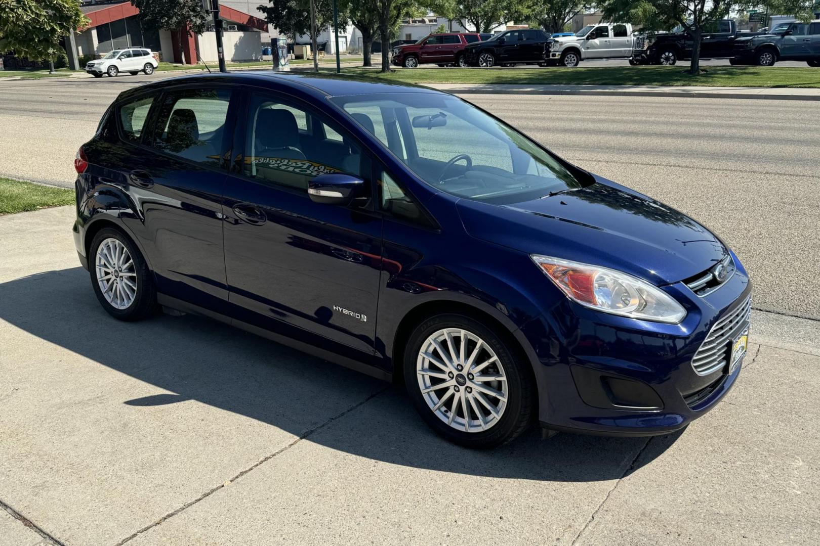 2016 Blue /Gray Ford C-Max Hybrid SE (1FADP5AU7GL) with an 4 Cyl 2.0 Liter Hybrid engine, Automatic transmission, located at 2304 W. Main St., Boise, ID, 83702, (208) 342-7777, 43.622105, -116.218658 - Photo#1