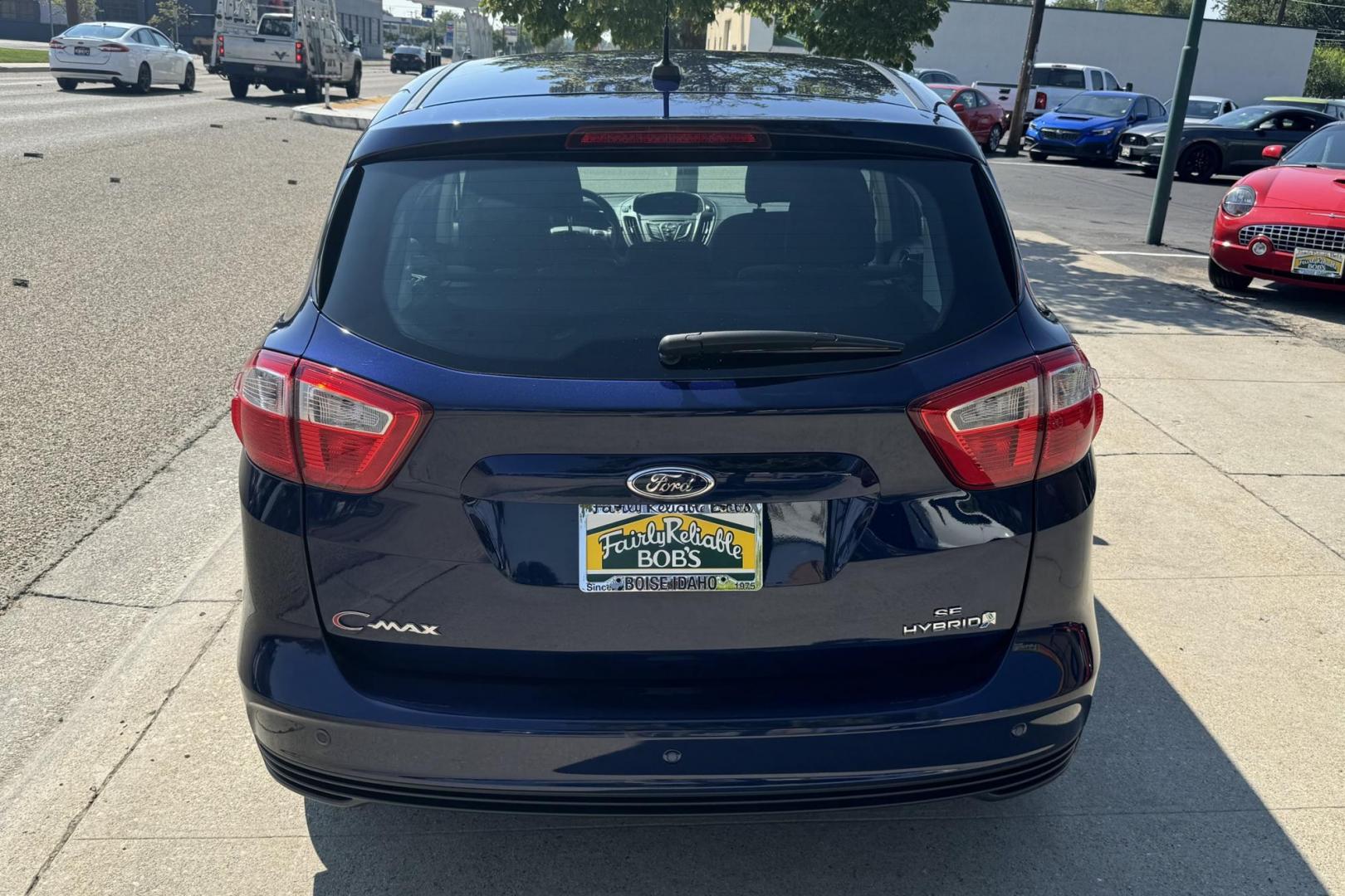 2016 Blue /Gray Ford C-Max Hybrid SE (1FADP5AU7GL) with an 4 Cyl 2.0 Liter Hybrid engine, Automatic transmission, located at 2304 W. Main St., Boise, ID, 83702, (208) 342-7777, 43.622105, -116.218658 - Photo#2