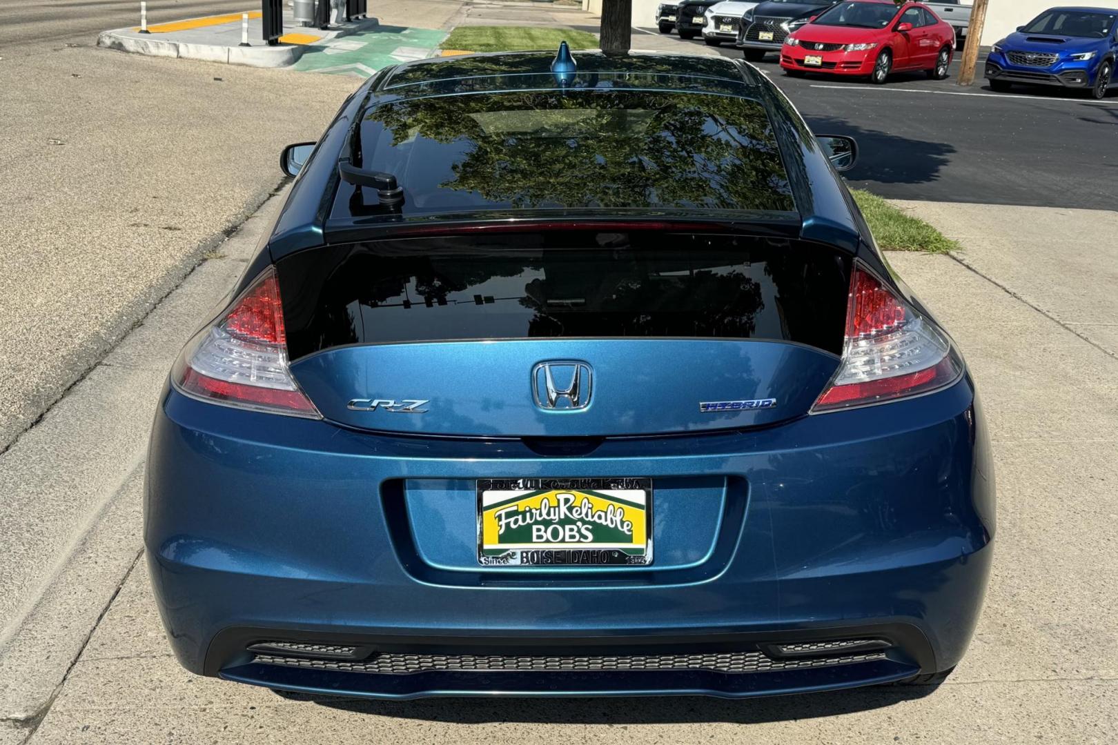 2013 North Shore Blue Pearl /Black Honda CR-Z EX EX (JHMZF1D66DS) with an 4 Cyl 1.5 Liter Hybrid engine, Automatic transmission, located at 2304 W. Main St., Boise, ID, 83702, (208) 342-7777, 43.622105, -116.218658 - Photo#2