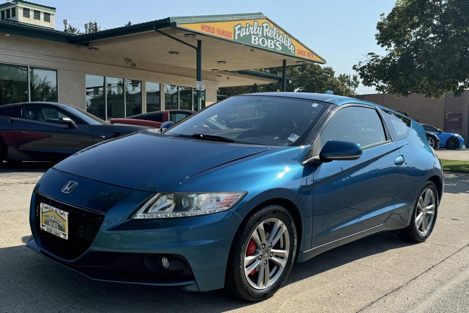 2013 North Shore Blue Pearl /Black Honda CR-Z EX EX (JHMZF1D66DS) with an 4 Cyl 1.5 Liter Hybrid engine, Automatic transmission, located at 2304 W. Main St., Boise, ID, 83702, (208) 342-7777, 43.622105, -116.218658 - Photo#0