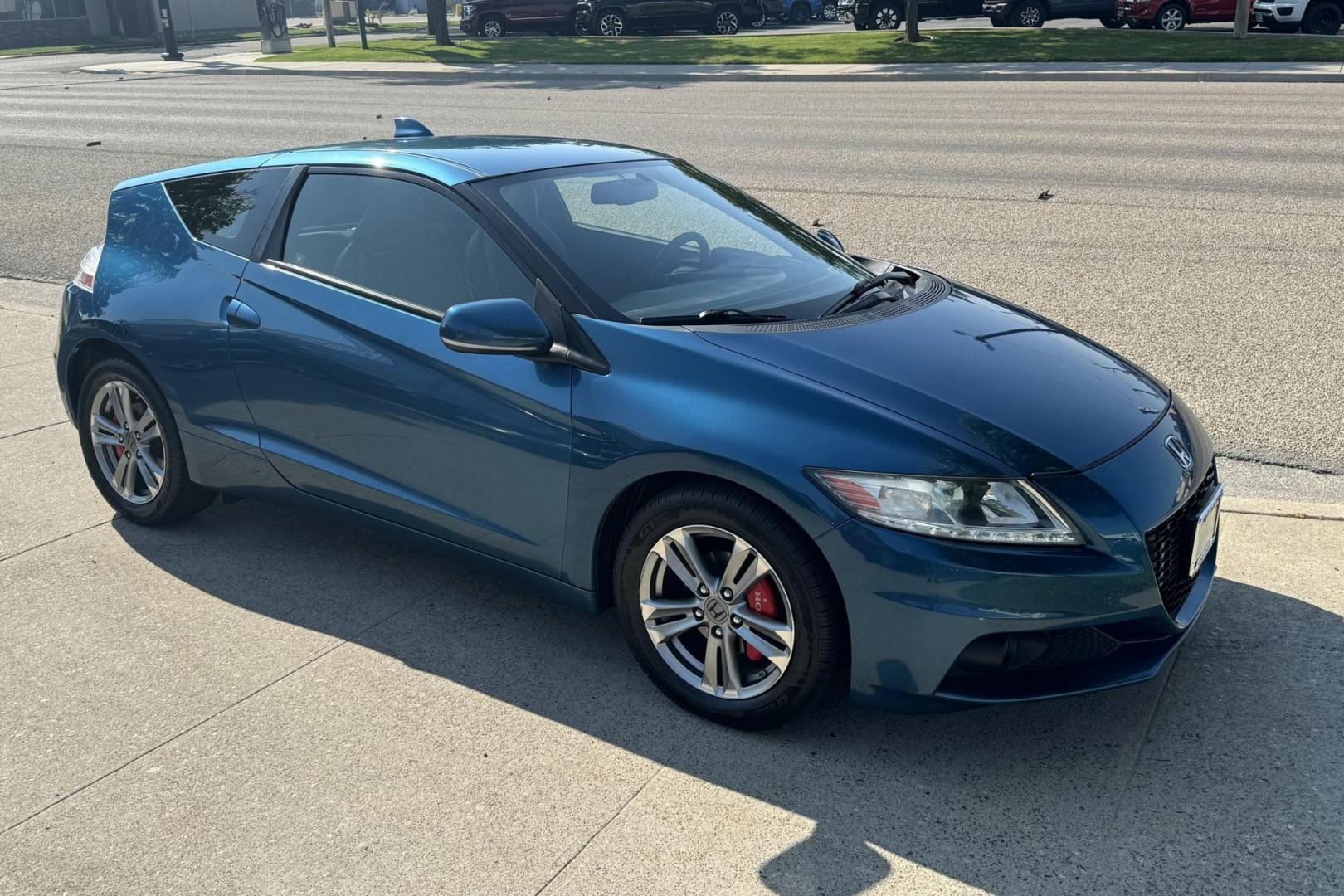 2013 North Shore Blue Pearl /Black Honda CR-Z EX EX (JHMZF1D66DS) with an 4 Cyl 1.5 Liter Hybrid engine, Automatic transmission, located at 2304 W. Main St., Boise, ID, 83702, (208) 342-7777, 43.622105, -116.218658 - Photo#1