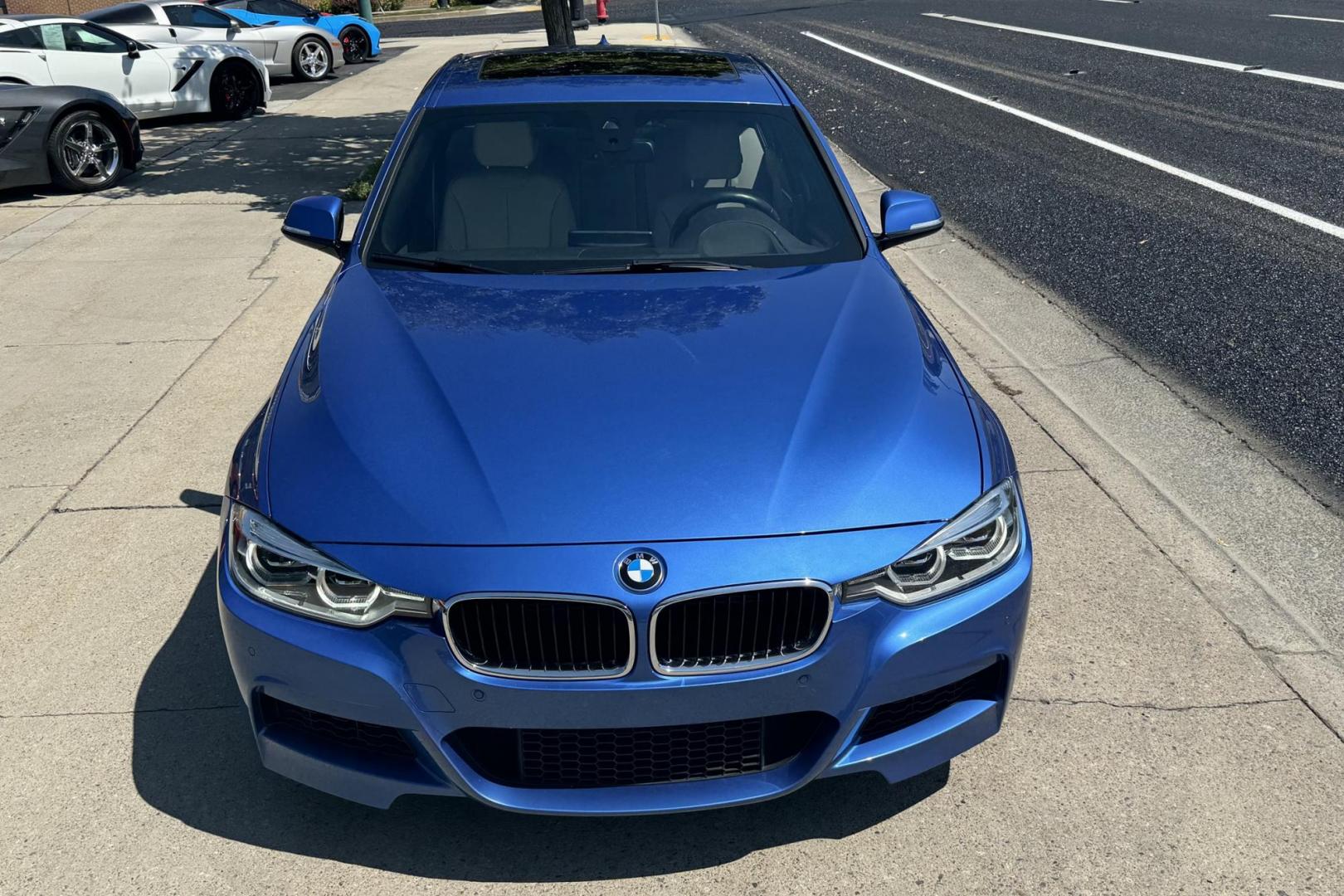 2016 Estoril Blue Metallic /Oyster Dakota Leather BMW 340i xDrive (WBA8B7C51GK) with an 6 Cyl 3.0 Liter Inline Twin Turbo engine, Automatic transmission, located at 2304 W. Main St., Boise, ID, 83702, (208) 342-7777, 43.622105, -116.218658 - Photo#2