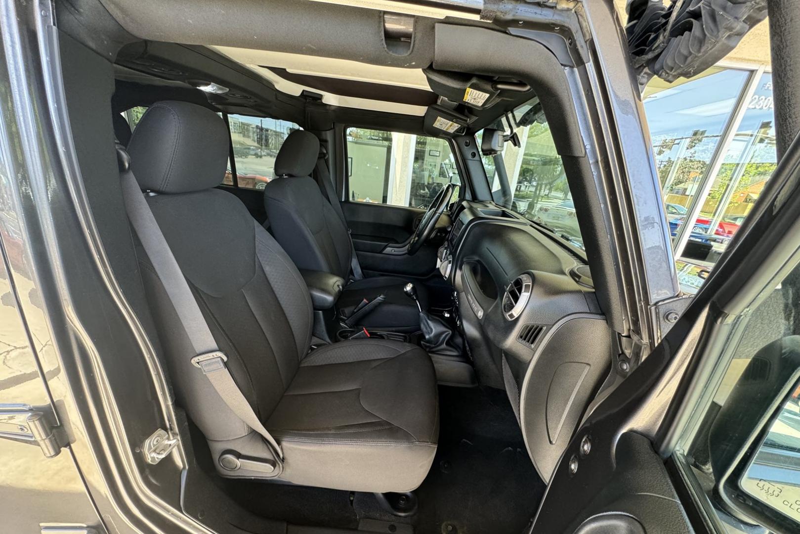2017 Gray /Black Jeep Wrangler Unlimited Sport Sport (1C4BJWDG6HL) with an V6 3.6 Liter engine, 6 Speed Manual transmission, located at 2304 W. Main St., Boise, ID, 83702, (208) 342-7777, 43.622105, -116.218658 - Photo#11
