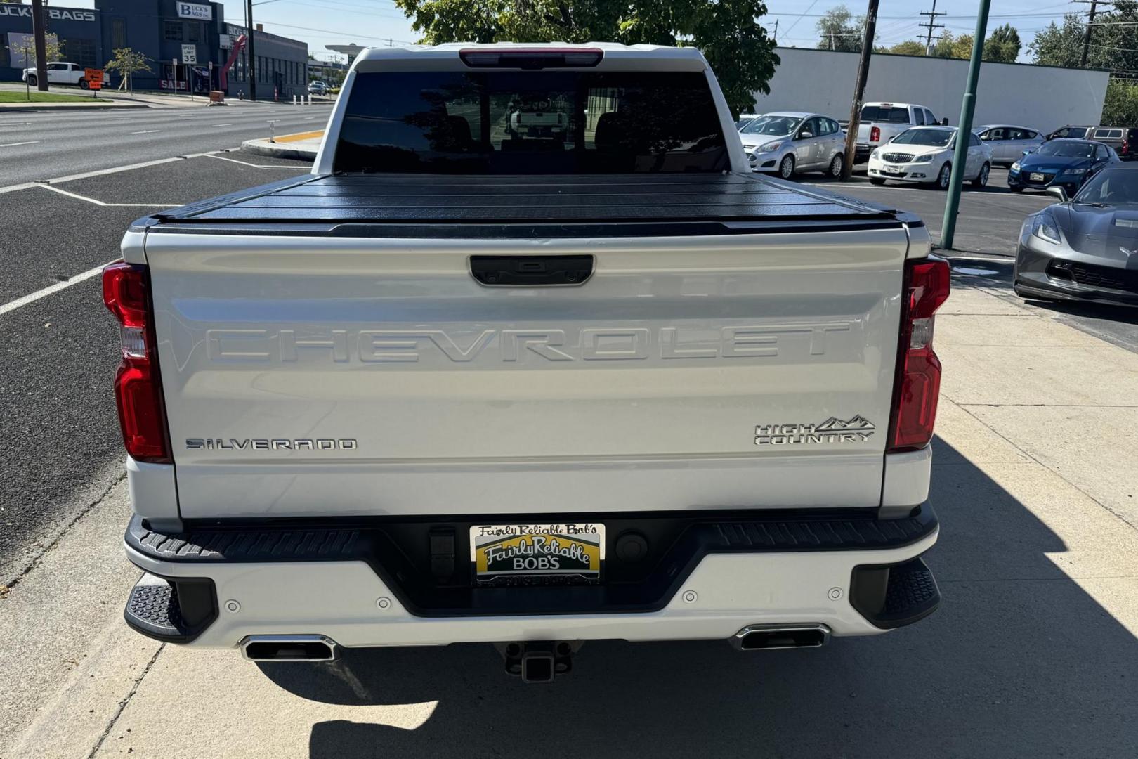 2022 Iridescent Pearl Tricoat /Jet Black/Nightshift Blue Chevrolet Silverado 1500 High Country High Country (3GCUDJEL6NG) with an V8 6.2 Liter engine, Automatic 10 Speed transmission, located at 2304 W. Main St., Boise, ID, 83702, (208) 342-7777, 43.622105, -116.218658 - One Owner Idaho Truck! - Photo#1