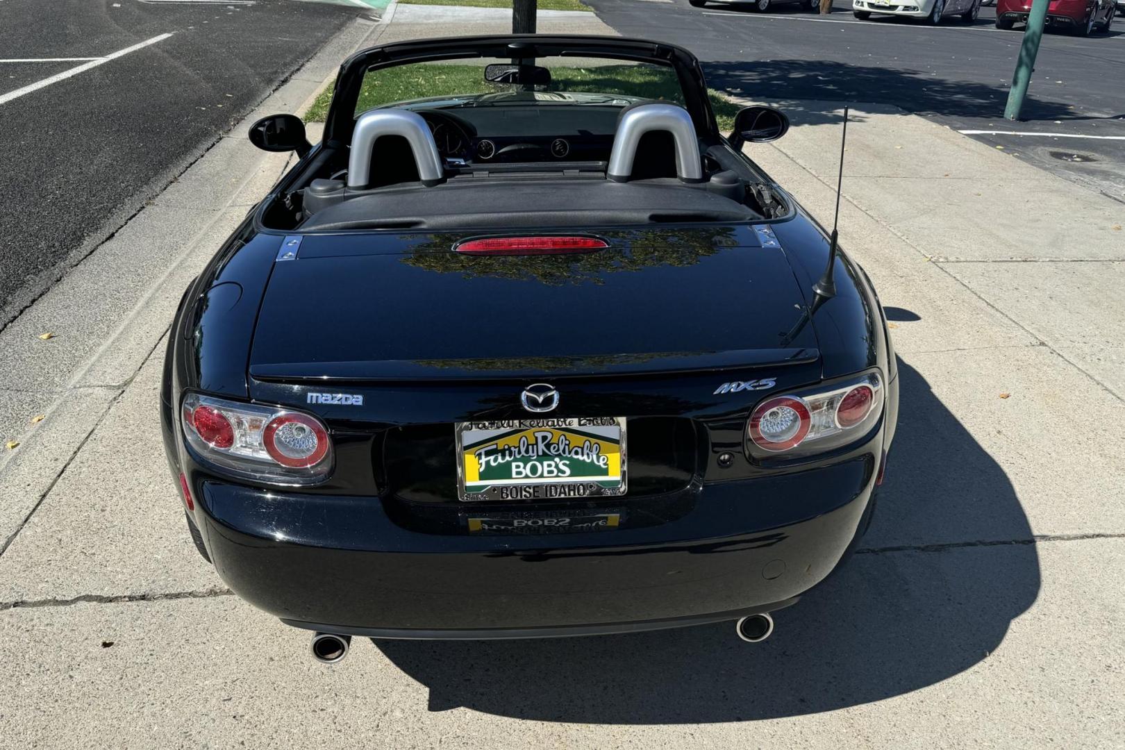 2006 Black /Black Mazda Miata MX-5 Sport (JM1NC25F660) with an 4 Cyl 2.0 Liter engine, 6 Speed Manual transmission, located at 2304 W. Main St., Boise, ID, 83702, (208) 342-7777, 43.622105, -116.218658 - Photo#1