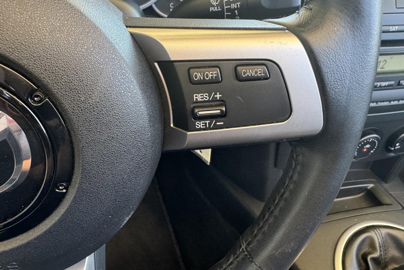 2006 Black /Black Mazda Miata MX-5 Sport (JM1NC25F660) with an 4 Cyl 2.0 Liter engine, 6 Speed Manual transmission, located at 2304 W. Main St., Boise, ID, 83702, (208) 342-7777, 43.622105, -116.218658 - Photo#10