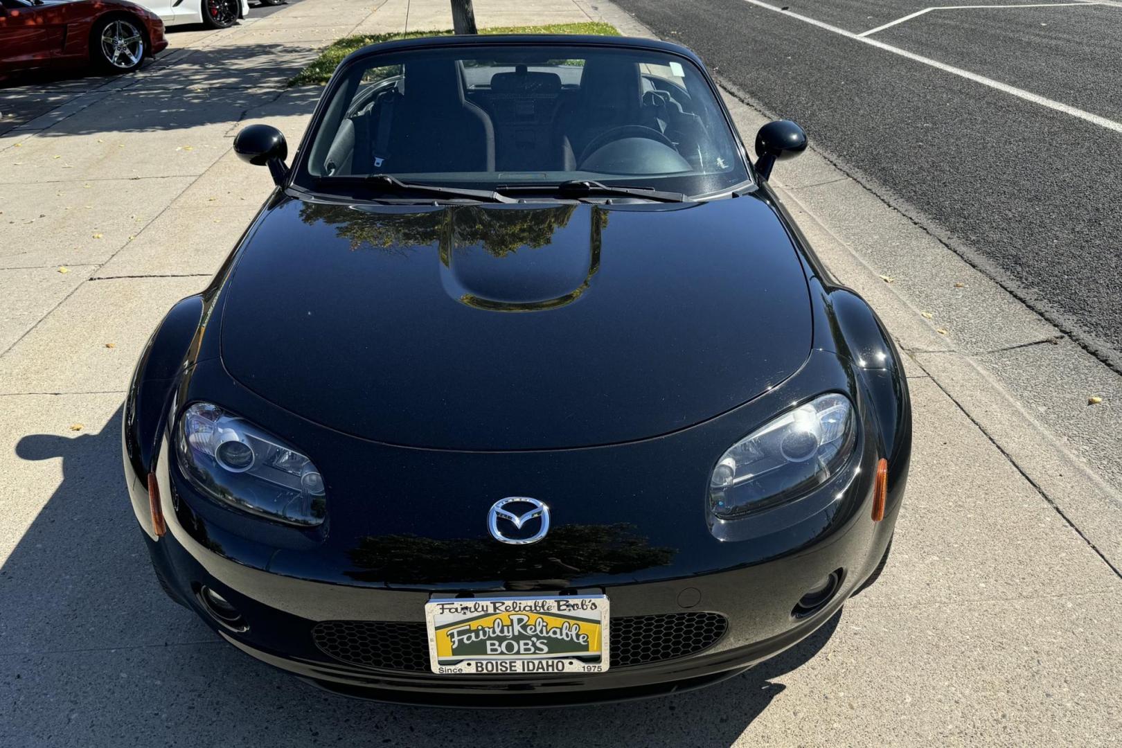 2006 Black /Black Mazda Miata MX-5 Sport (JM1NC25F660) with an 4 Cyl 2.0 Liter engine, 6 Speed Manual transmission, located at 2304 W. Main St., Boise, ID, 83702, (208) 342-7777, 43.622105, -116.218658 - Photo#3