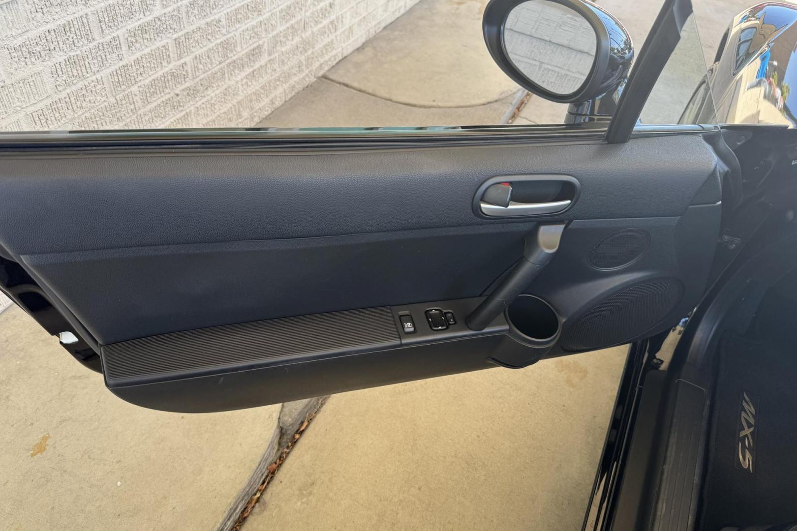 2006 Black /Black Mazda Miata MX-5 Sport (JM1NC25F660) with an 4 Cyl 2.0 Liter engine, 6 Speed Manual transmission, located at 2304 W. Main St., Boise, ID, 83702, (208) 342-7777, 43.622105, -116.218658 - Photo#4