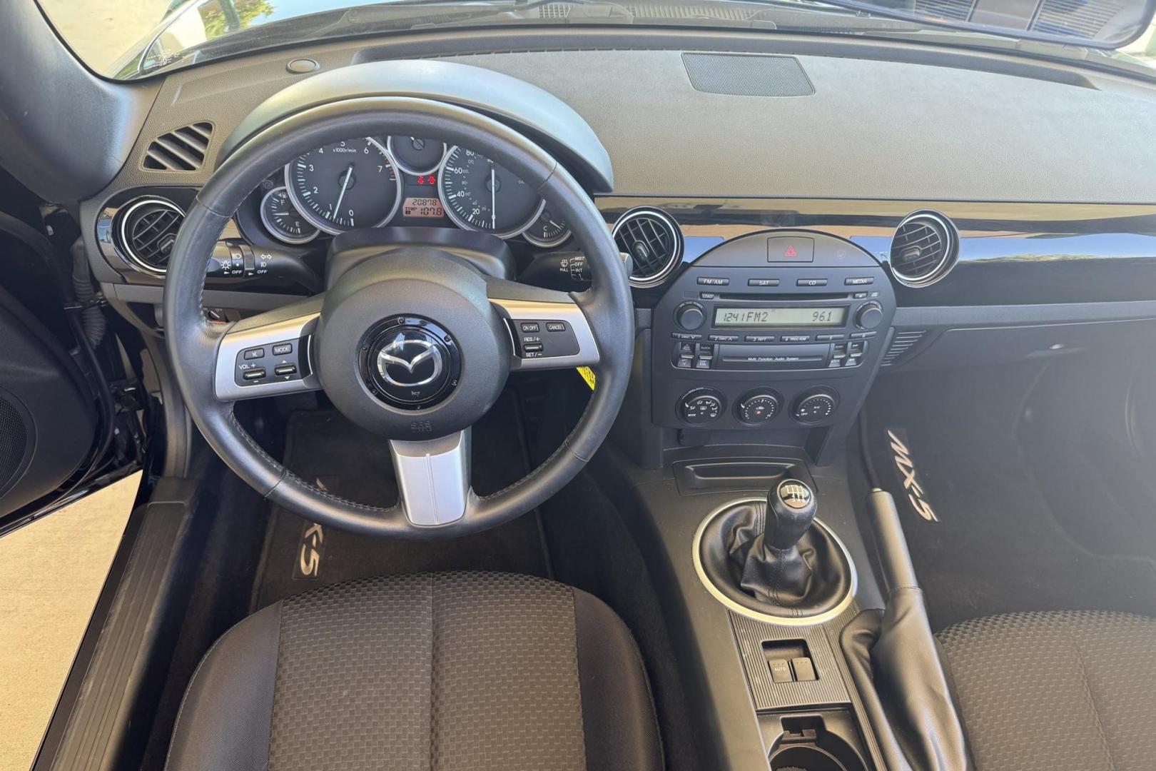 2006 Black /Black Mazda Miata MX-5 Sport (JM1NC25F660) with an 4 Cyl 2.0 Liter engine, 6 Speed Manual transmission, located at 2304 W. Main St., Boise, ID, 83702, (208) 342-7777, 43.622105, -116.218658 - Photo#5