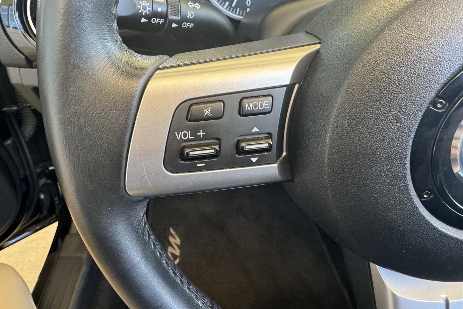 2006 Black /Black Mazda Miata MX-5 Sport (JM1NC25F660) with an 4 Cyl 2.0 Liter engine, 6 Speed Manual transmission, located at 2304 W. Main St., Boise, ID, 83702, (208) 342-7777, 43.622105, -116.218658 - Photo#8