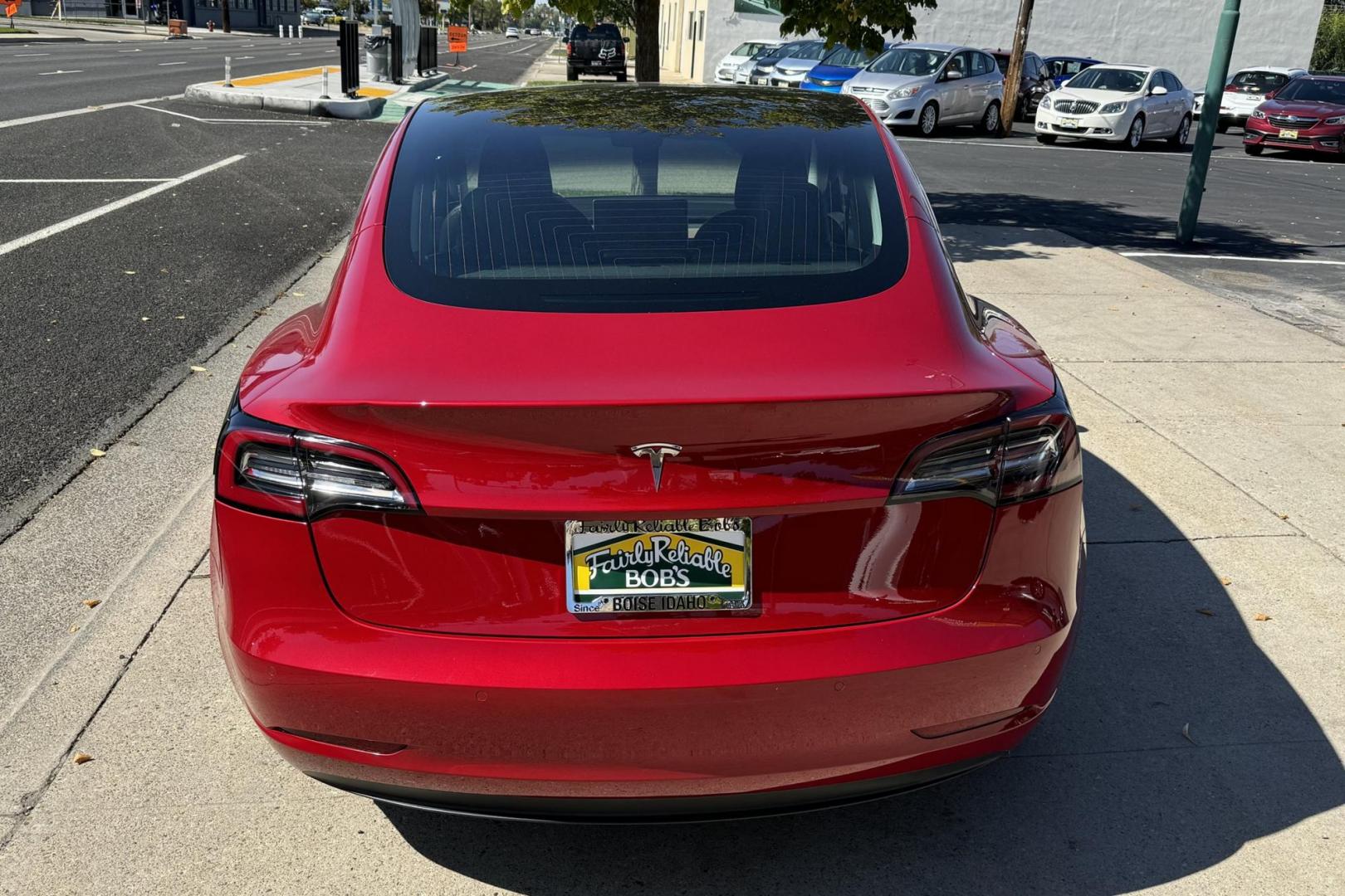 2018 Red Muti-Coat /Black Tesla Model 3 LR (5YJ3E1EA9JF) with an 75 kWh engine, Automatic transmission, located at 2304 W. Main St., Boise, ID, 83702, (208) 342-7777, 43.622105, -116.218658 - Photo#1
