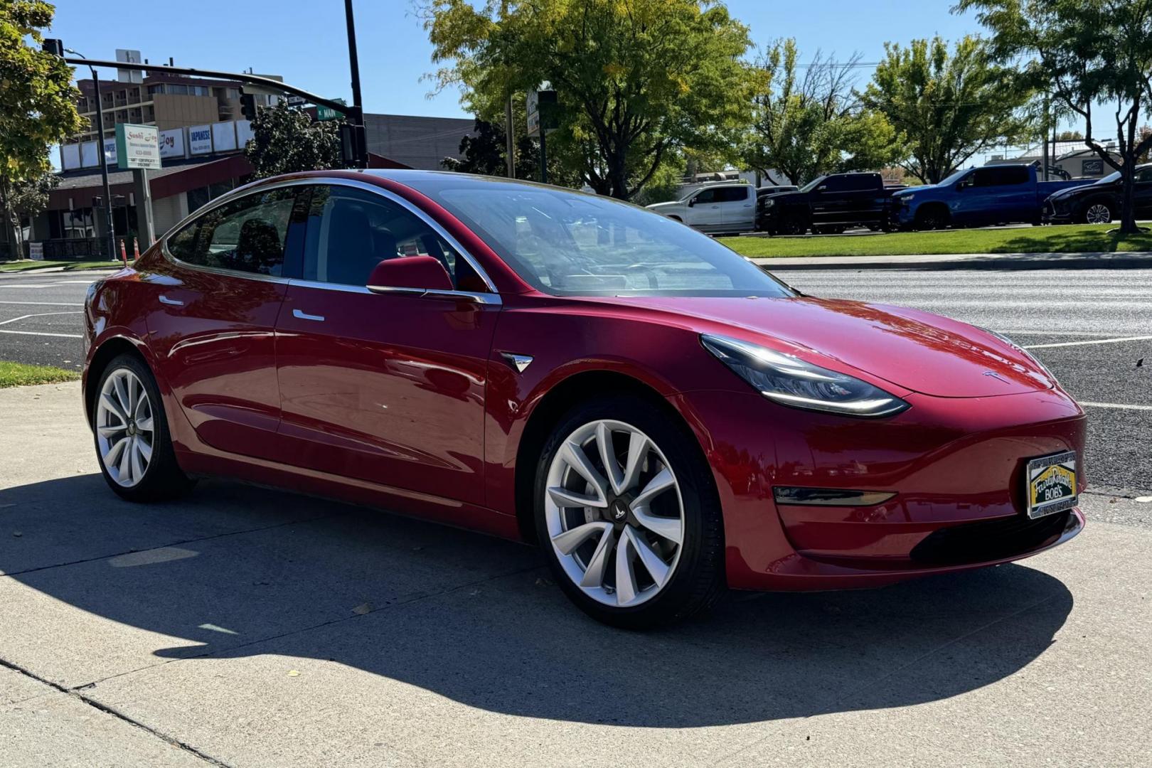 2018 Red Muti-Coat /Black Tesla Model 3 LR (5YJ3E1EA9JF) with an 75 kWh engine, Automatic transmission, located at 2304 W. Main St., Boise, ID, 83702, (208) 342-7777, 43.622105, -116.218658 - Photo#2