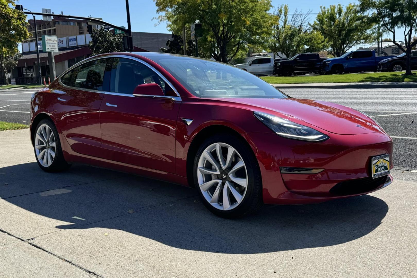 2018 Red Muti-Coat /Black Tesla Model 3 LR (5YJ3E1EA9JF) with an 75 kWh engine, Automatic transmission, located at 2304 W. Main St., Boise, ID, 83702, (208) 342-7777, 43.622105, -116.218658 - Photo#27