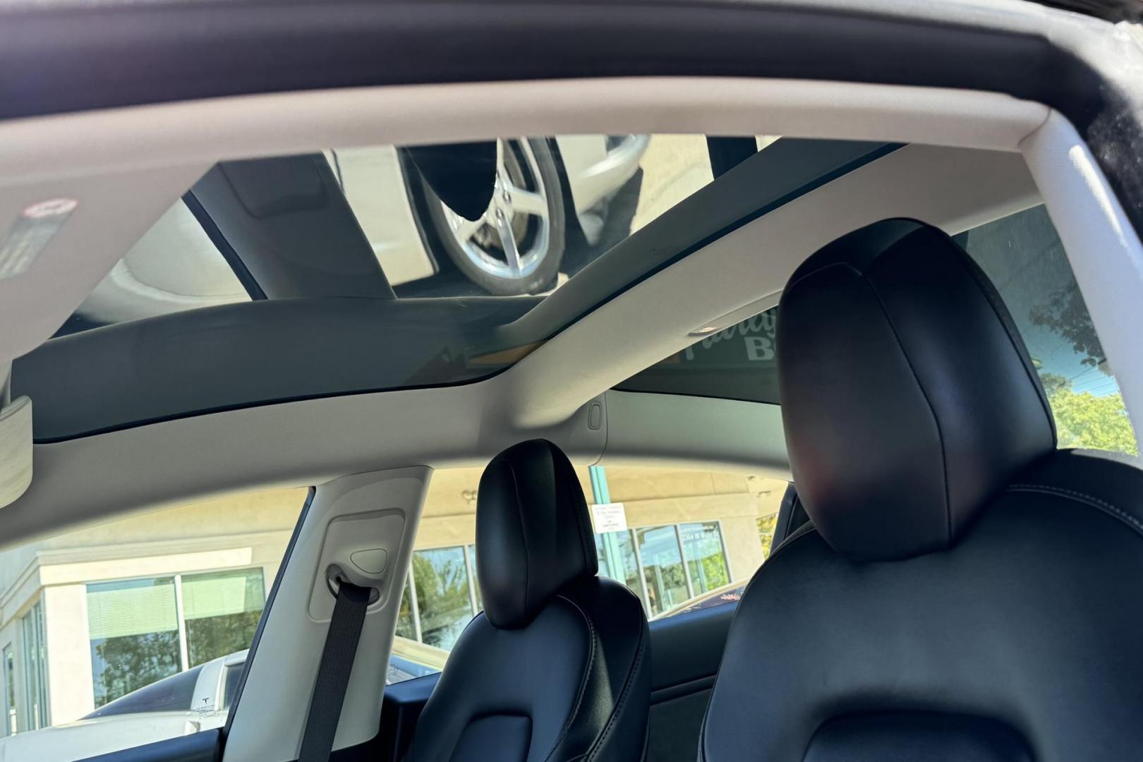 2018 Red Muti-Coat /Black Tesla Model 3 LR (5YJ3E1EA9JF) with an 75 kWh engine, Automatic transmission, located at 2304 W. Main St., Boise, ID, 83702, (208) 342-7777, 43.622105, -116.218658 - Photo#4