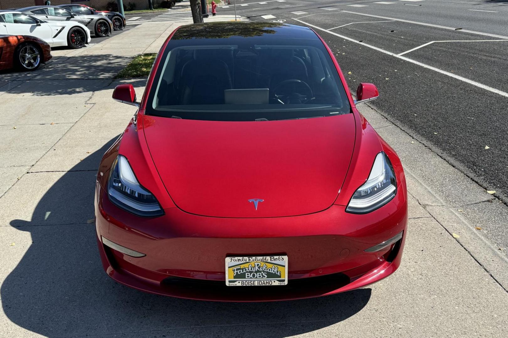 2018 Red Muti-Coat /Black Tesla Model 3 LR (5YJ3E1EA9JF) with an 75 kWh engine, Automatic transmission, located at 2304 W. Main St., Boise, ID, 83702, (208) 342-7777, 43.622105, -116.218658 - Photo#3