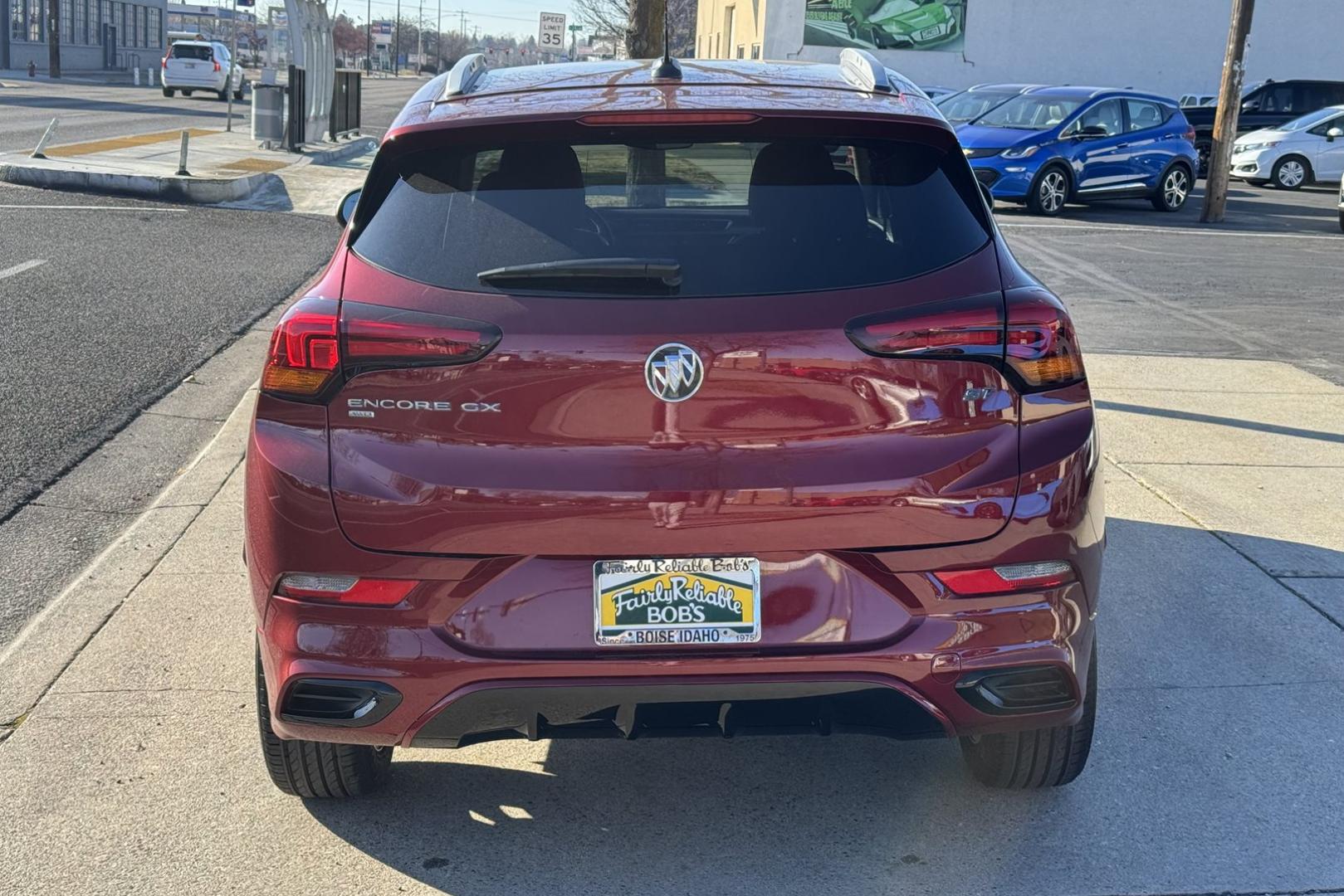 2022 Cinnabar Metallic /Black Buick Encore GX Select (KL4MMESL7NB) with an 3 Cyl 1.3 Liter Turbo engine, Automatic 9 Speed transmission, located at 2304 W. Main St., Boise, ID, 83702, (208) 342-7777, 43.622105, -116.218658 - New Tires! Idaho Vehicle! All Wheel Drive! - Photo#3
