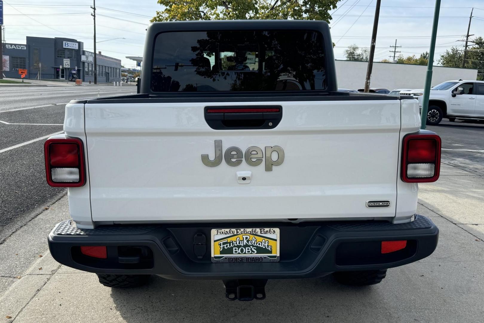 2023 White /Black Jeep Gladiator Overland (1C6HJTFG9PL) with an V6 3.6 Liter engine, Automatic 8 Speed transmission, located at 2304 W. Main St., Boise, ID, 83702, (208) 342-7777, 43.622105, -116.218658 - Remaining Factory Warranty! Must Drive To Appreciate! - Photo#1