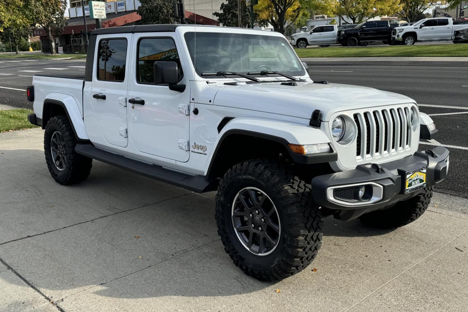 2023 White /Black Jeep Gladiator Overland (1C6HJTFG9PL) with an V6 3.6 Liter engine, Automatic 8 Speed transmission, located at 2304 W. Main St., Boise, ID, 83702, (208) 342-7777, 43.622105, -116.218658 - Remaining Factory Warranty! Must Drive To Appreciate! - Photo#2