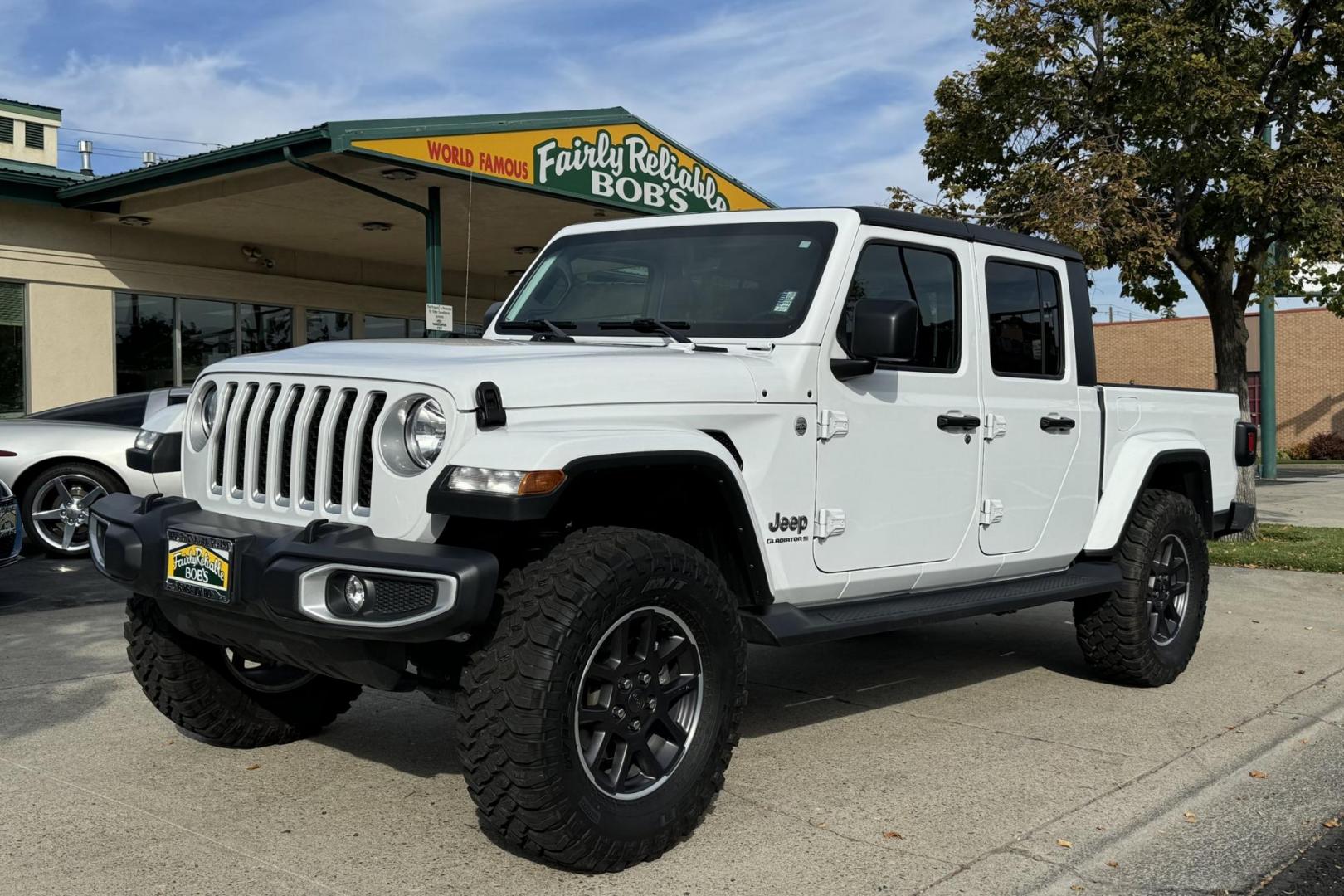 2023 White /Black Jeep Gladiator Overland (1C6HJTFG9PL) with an V6 3.6 Liter engine, Automatic 8 Speed transmission, located at 2304 W. Main St., Boise, ID, 83702, (208) 342-7777, 43.622105, -116.218658 - Remaining Factory Warranty! Must Drive To Appreciate! - Photo#0